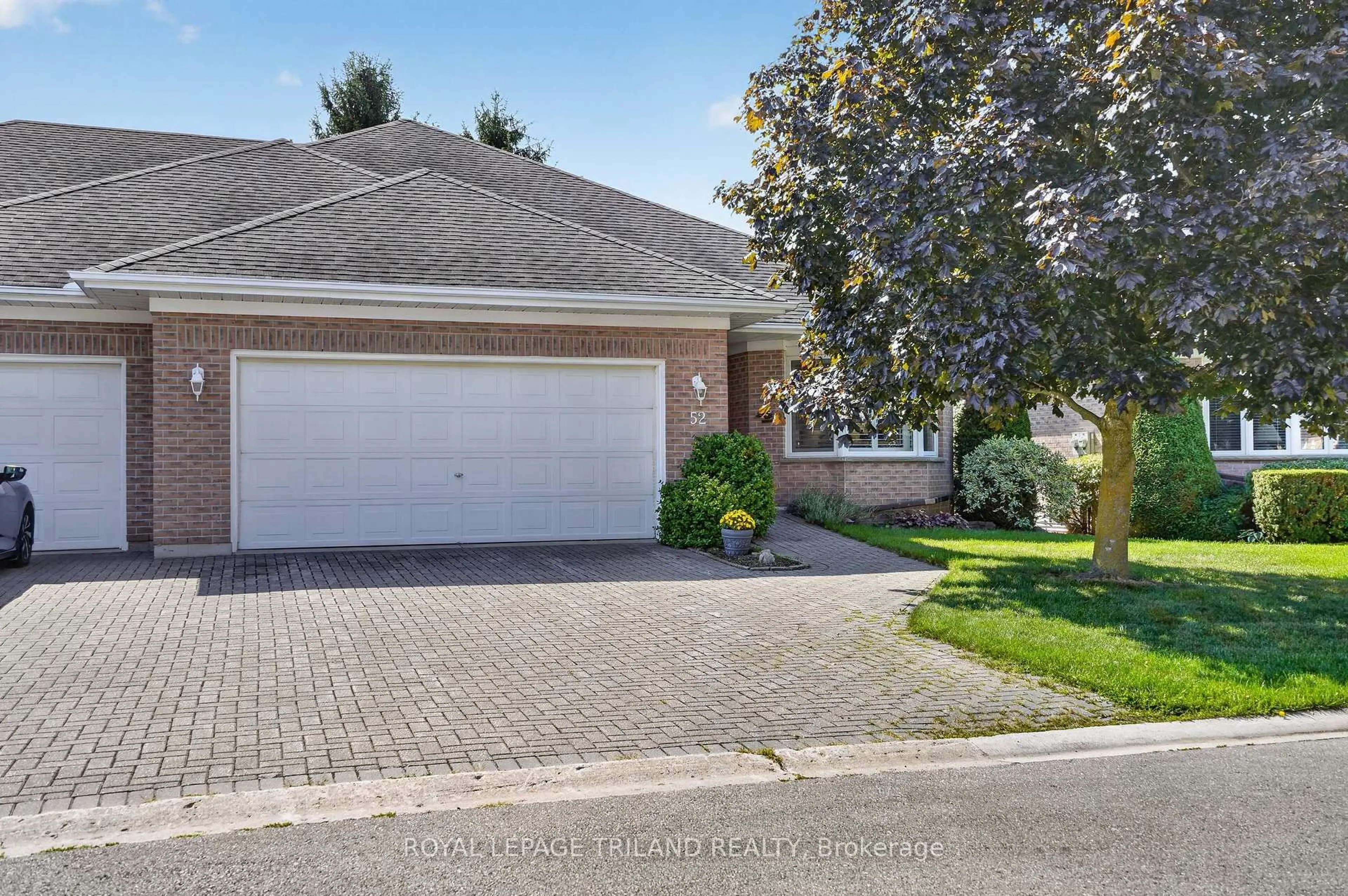 Home with brick exterior material, street for 52 Ilderbrook Circ, Middlesex Centre Ontario N0M 2A0