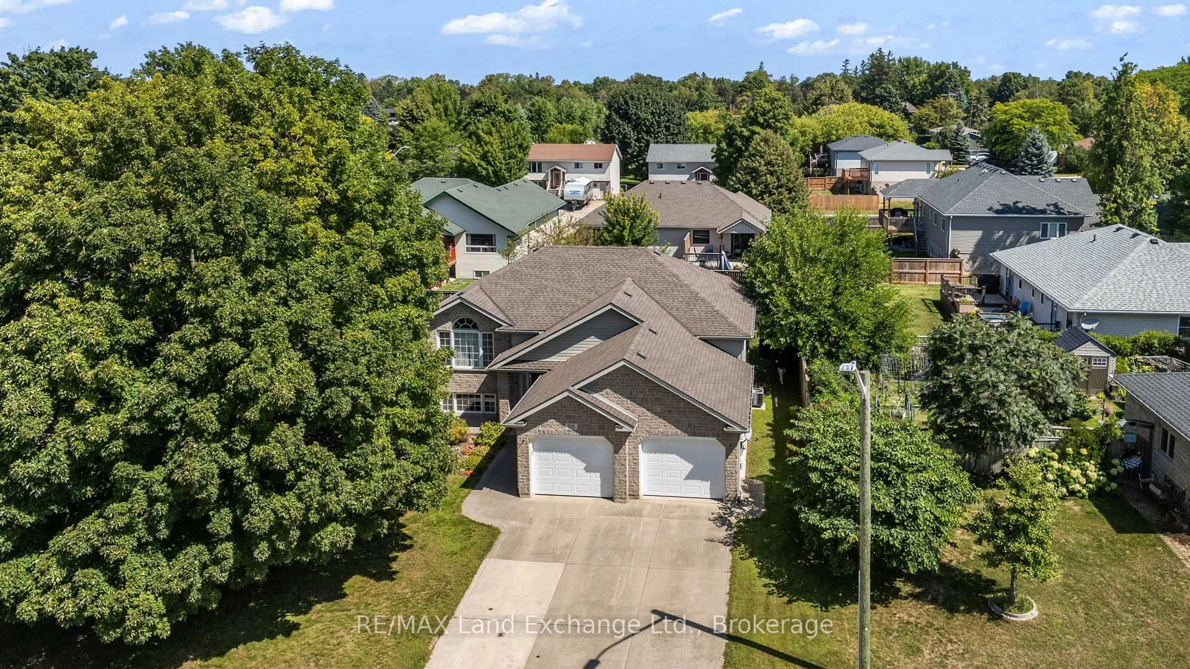 A pic from outside/outdoor area/front of a property/back of a property/a pic from drone, street for 513 Peirson Ave, Saugeen Shores Ontario N0H 2C1