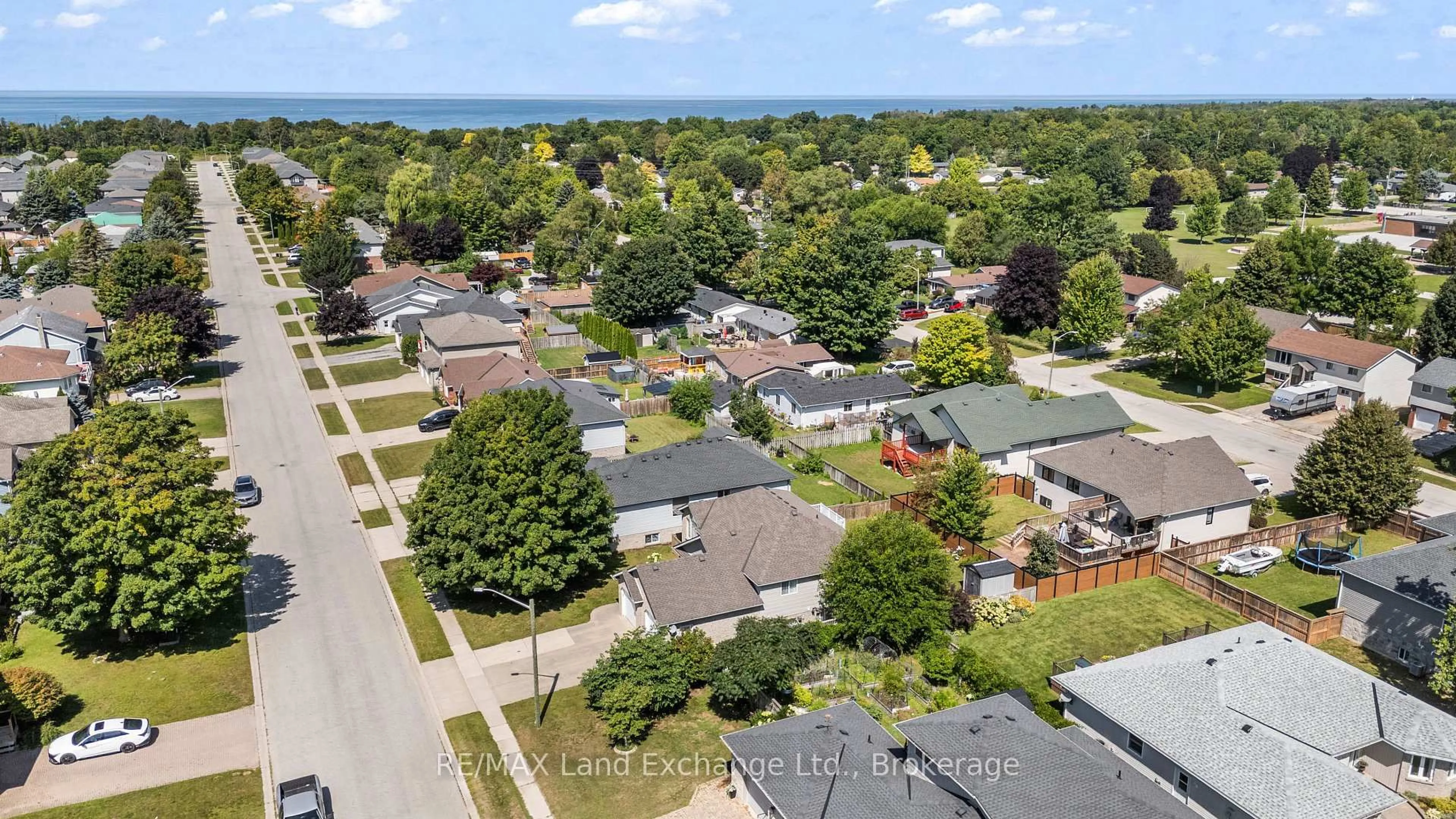 A pic from outside/outdoor area/front of a property/back of a property/a pic from drone, street for 513 Peirson Ave, Saugeen Shores Ontario N0H 2C1