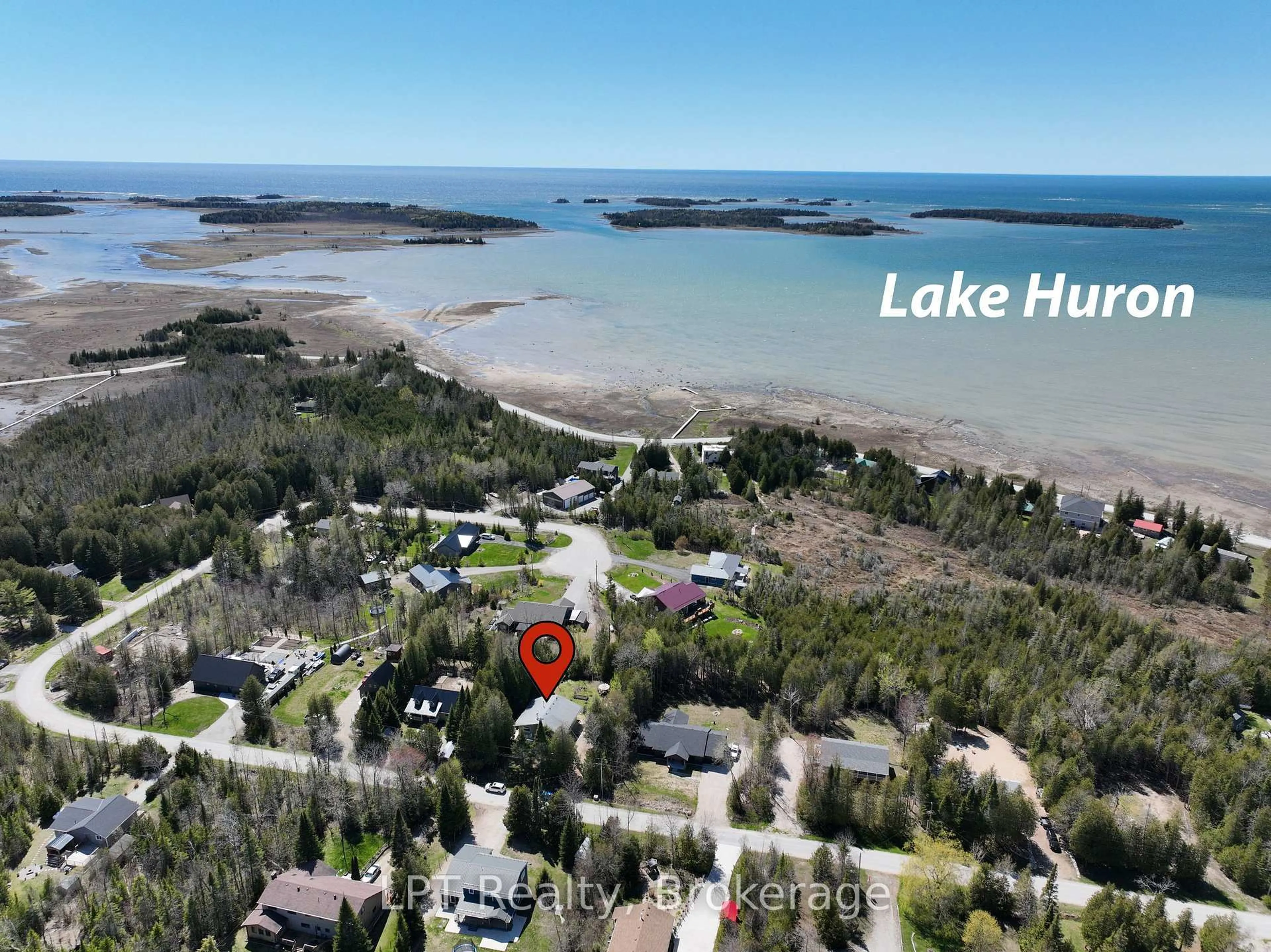 A pic from outside/outdoor area/front of a property/back of a property/a pic from drone, water/lake/river/ocean view for 42 William Crt, South Bruce Peninsula Ontario N0H 2T0