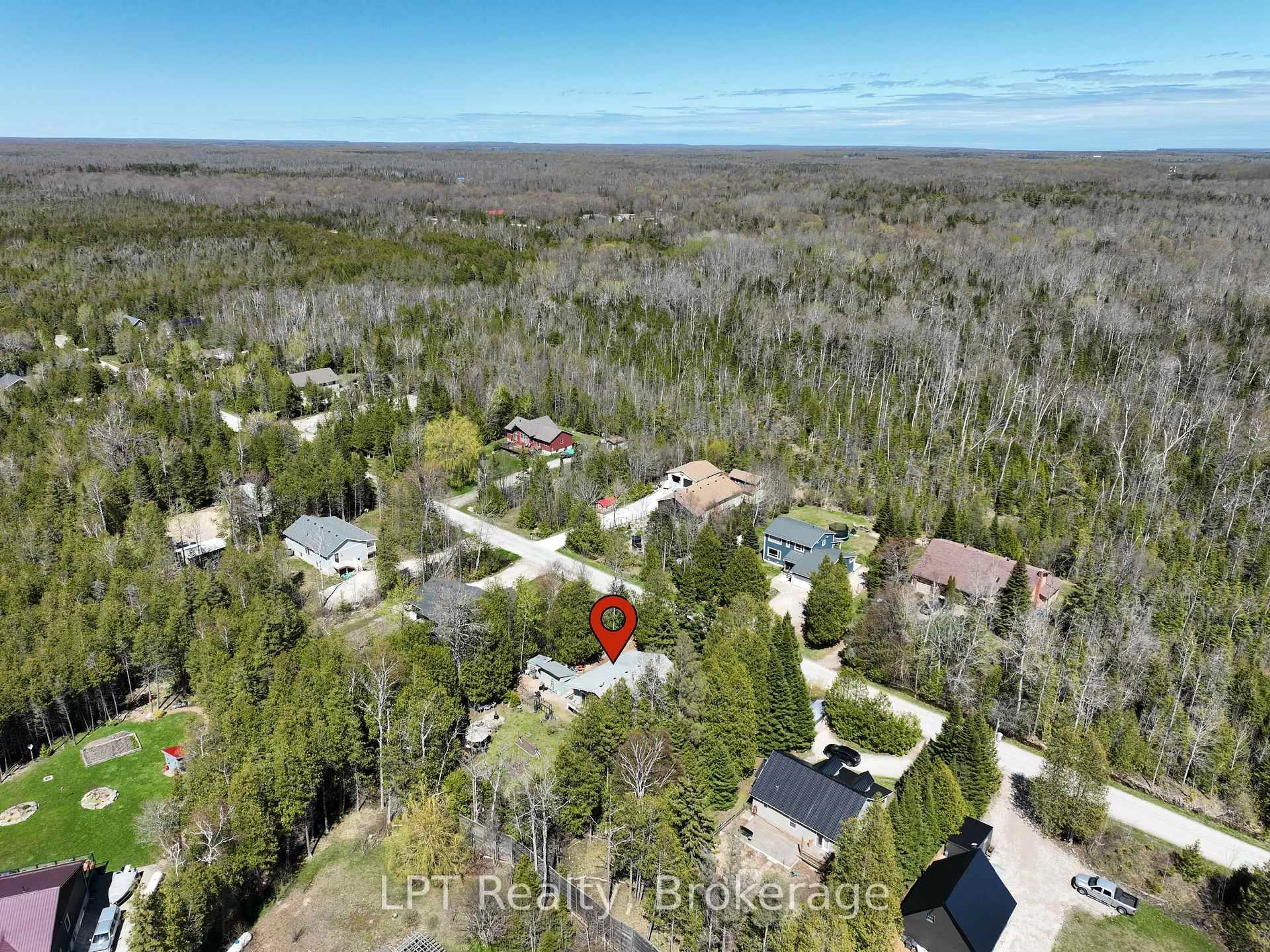 A pic from outside/outdoor area/front of a property/back of a property/a pic from drone, forest/trees view for 42 William Crt, South Bruce Peninsula Ontario N0H 2T0