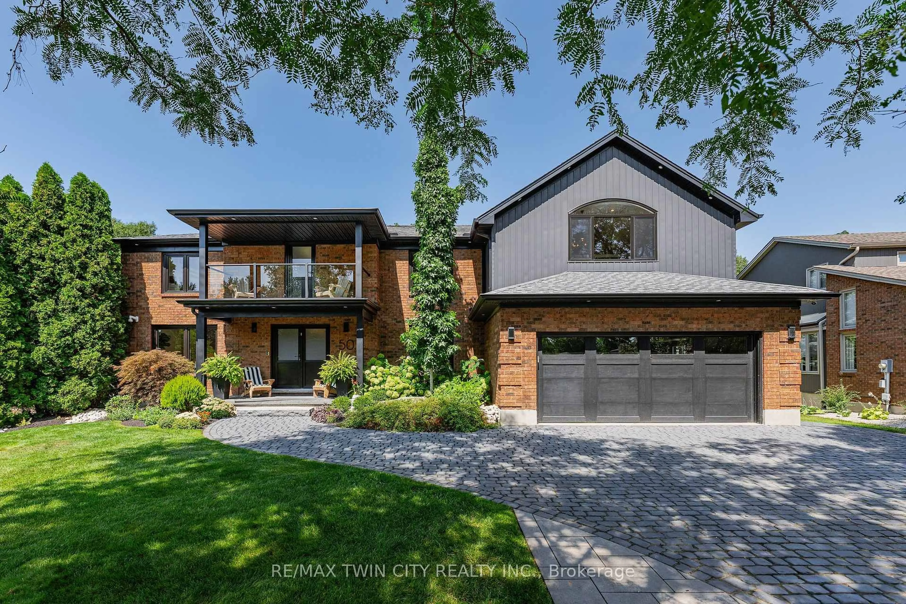 Home with brick exterior material, street for 50 Roehampton Crt, Kitchener Ontario N2A 3L1