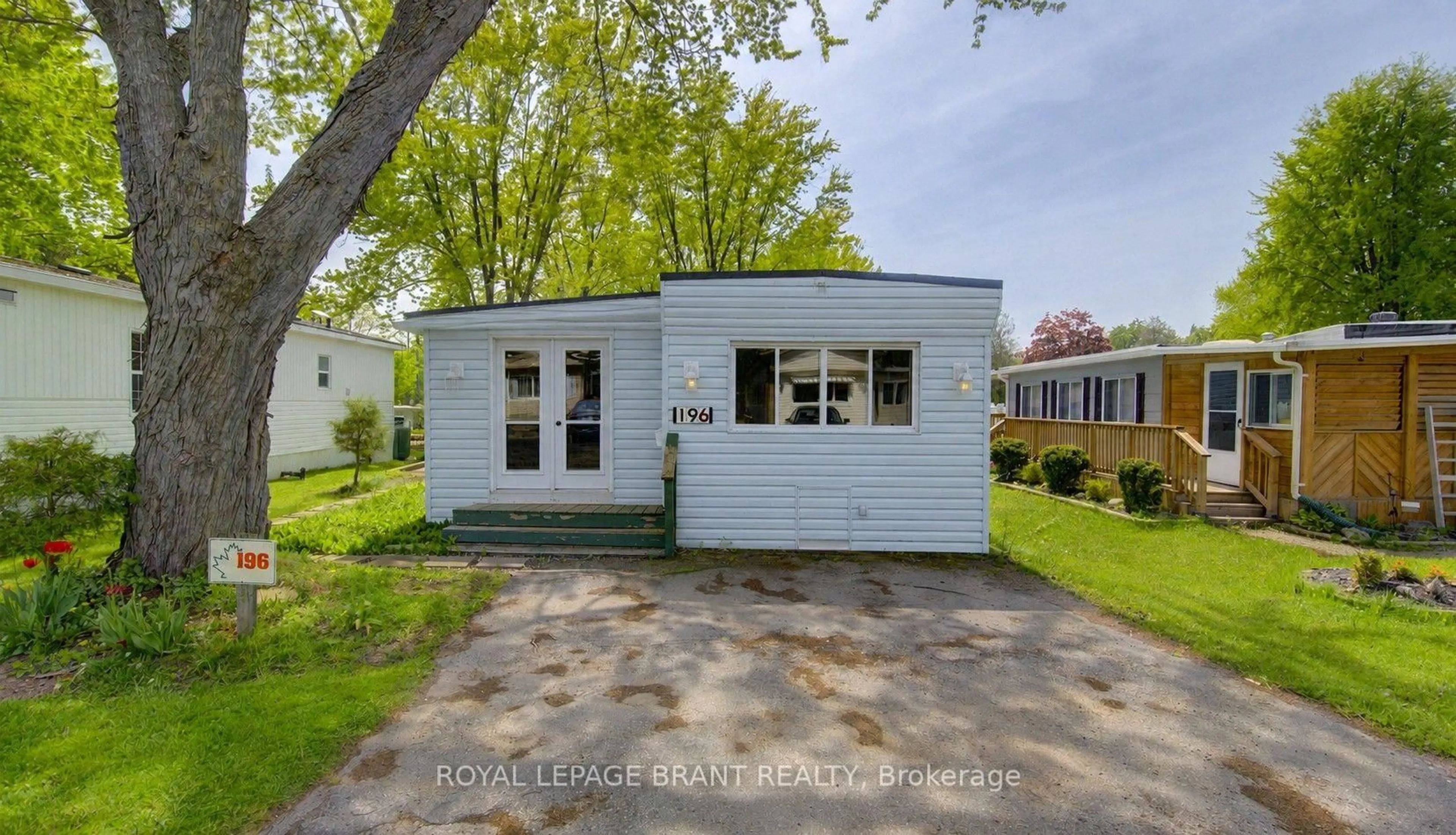 Home with vinyl exterior material, street for 580 Beaver Creek Rd #196, Waterloo Ontario N2J 3Z4