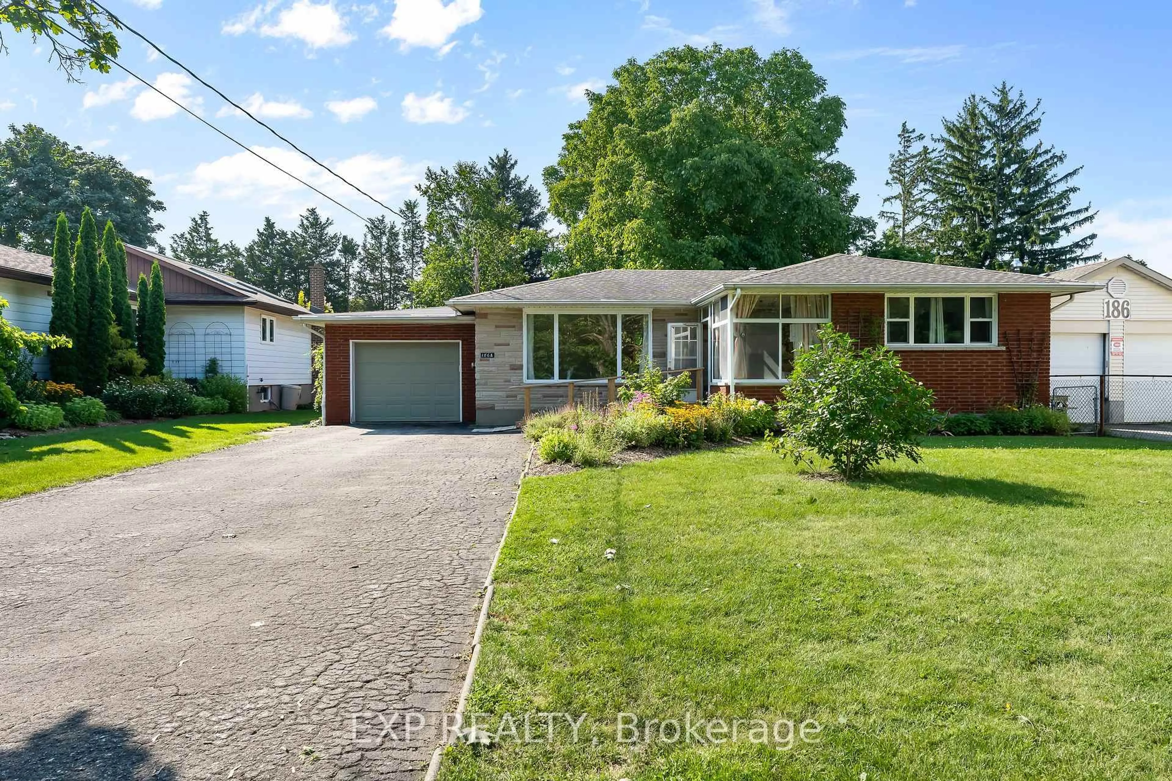 Home with brick exterior material, street for 186A Lakeshore Rd, St. Catharines Ontario L2N 2V3