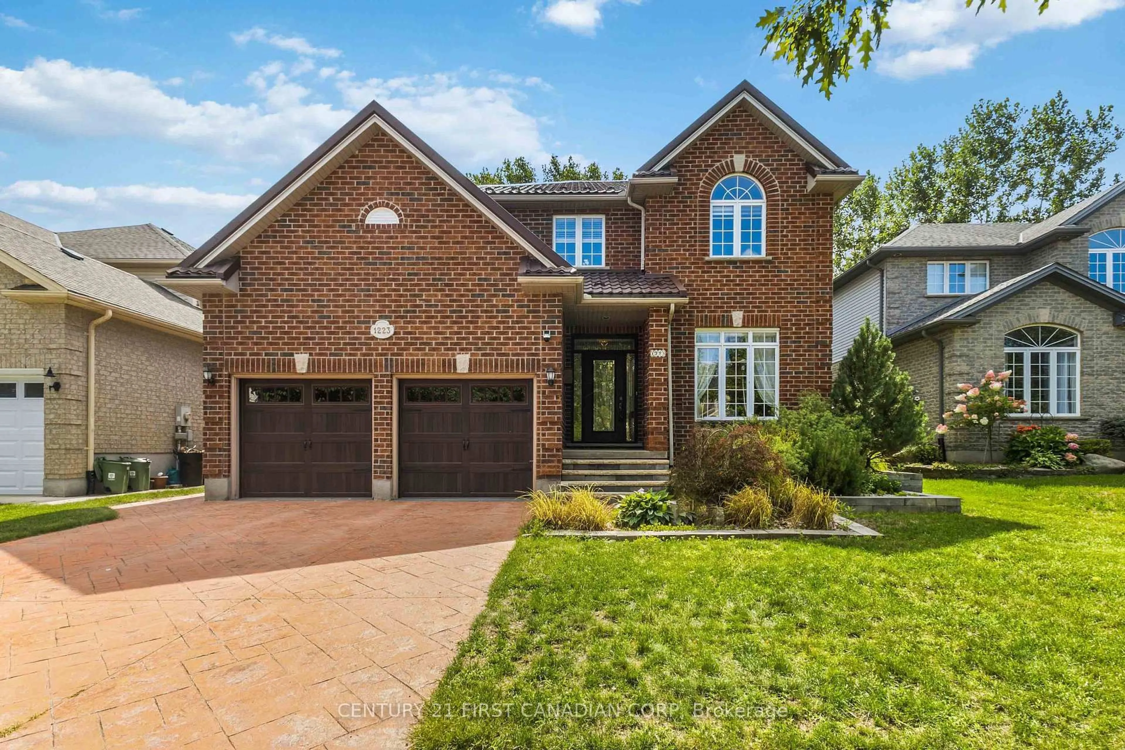 Home with brick exterior material, street for 1223 Thornley St, London South Ontario N6K 4V3