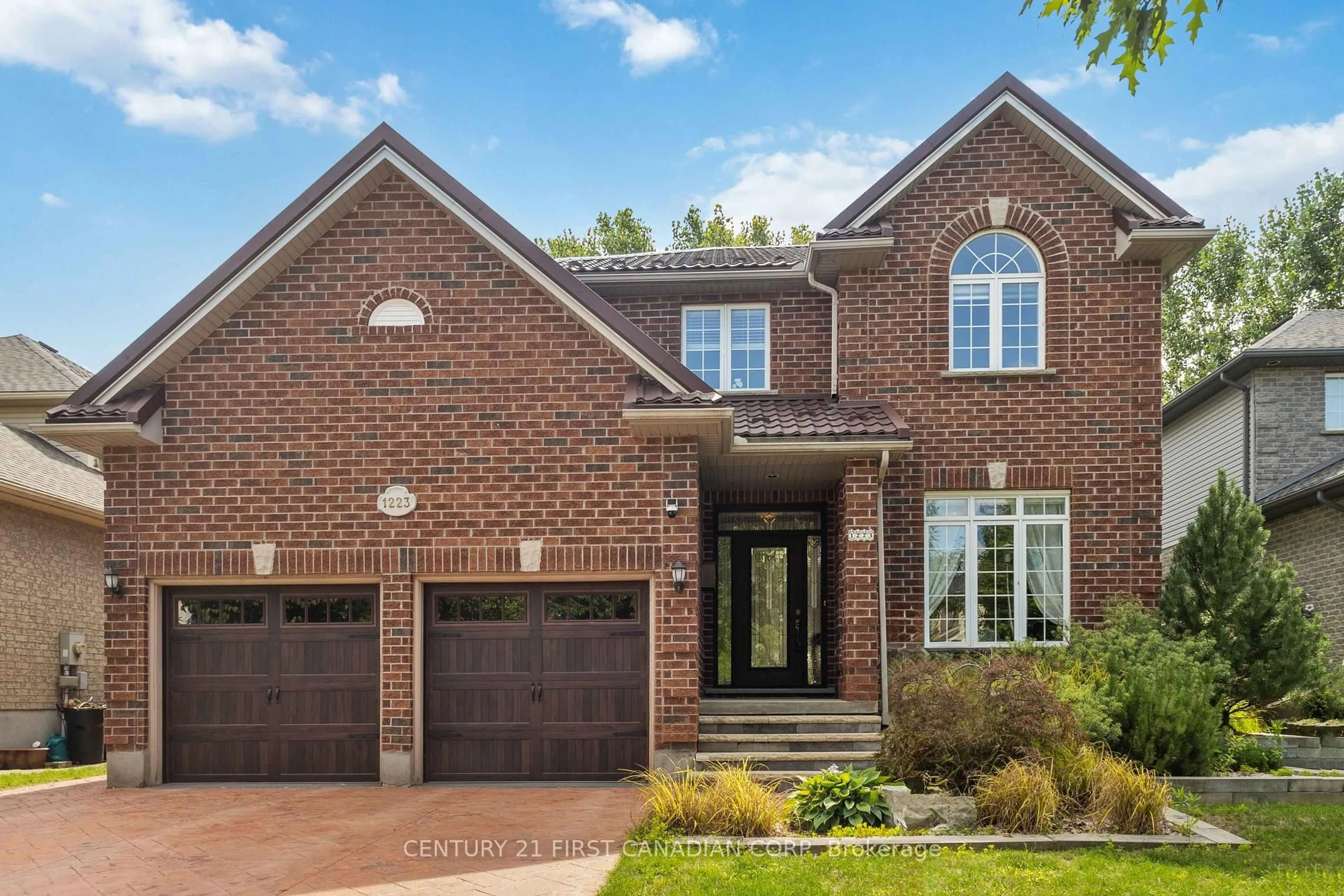 Home with brick exterior material, street for 1223 Thornley St, London South Ontario N6K 4V3