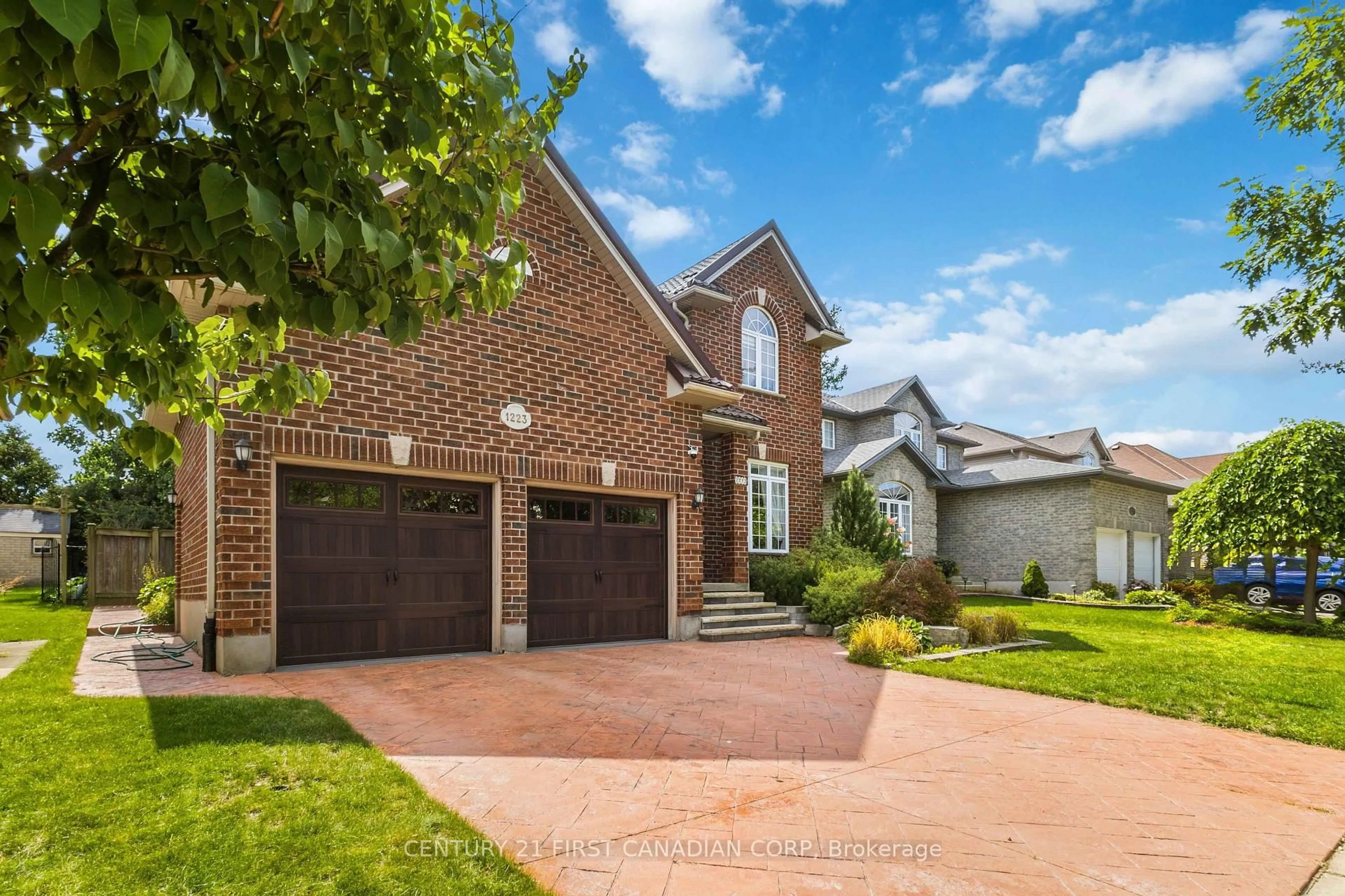 Home with brick exterior material, street for 1223 Thornley St, London South Ontario N6K 4V3
