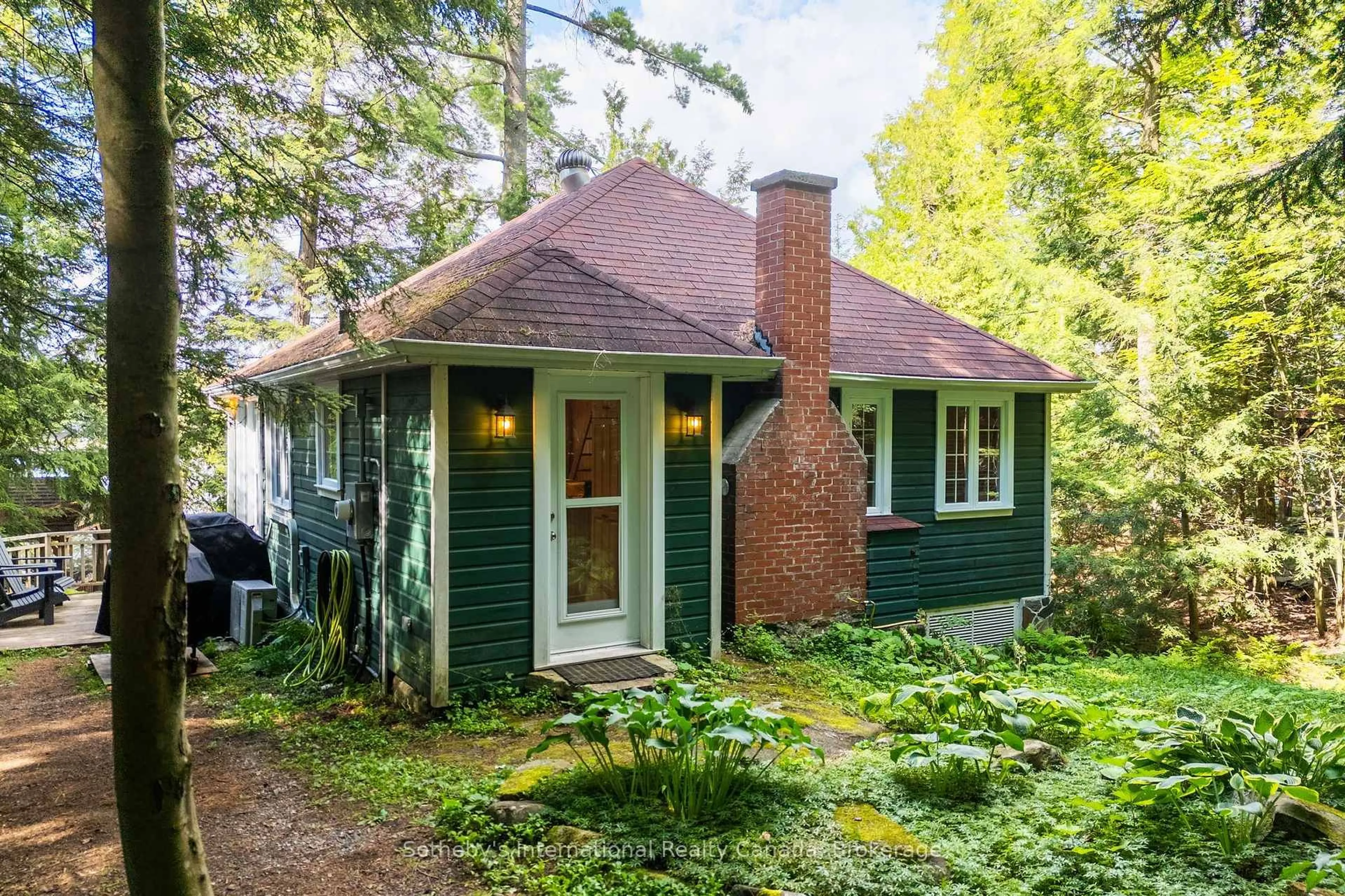 Home with brick exterior material, street for 1061 Hurling Point Rd, Muskoka Lakes Ontario P0C 1A0