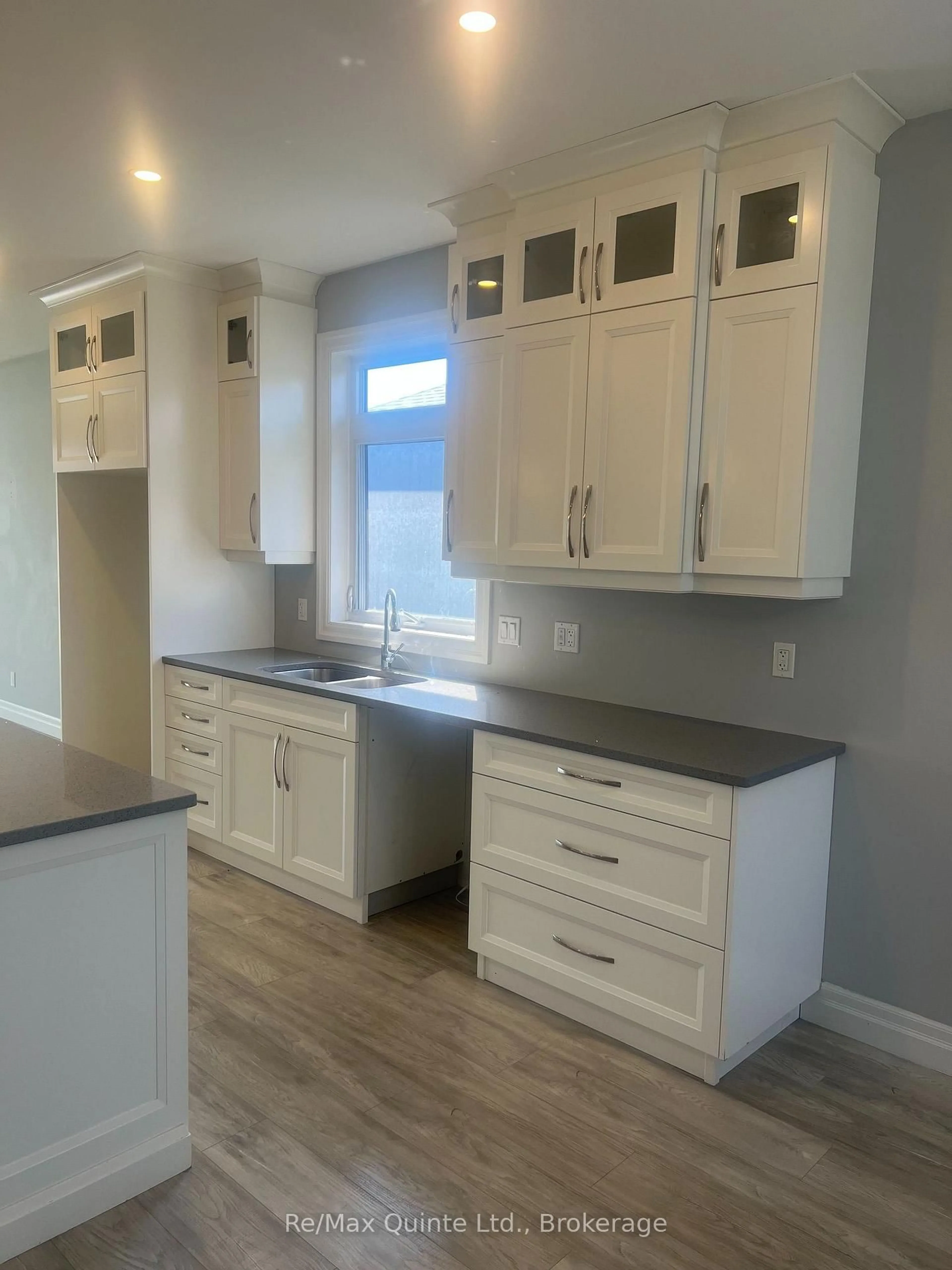 Open concept kitchen, wood/laminate floor for 29 Gavin Cres, Quinte West Ontario K8V 0H2