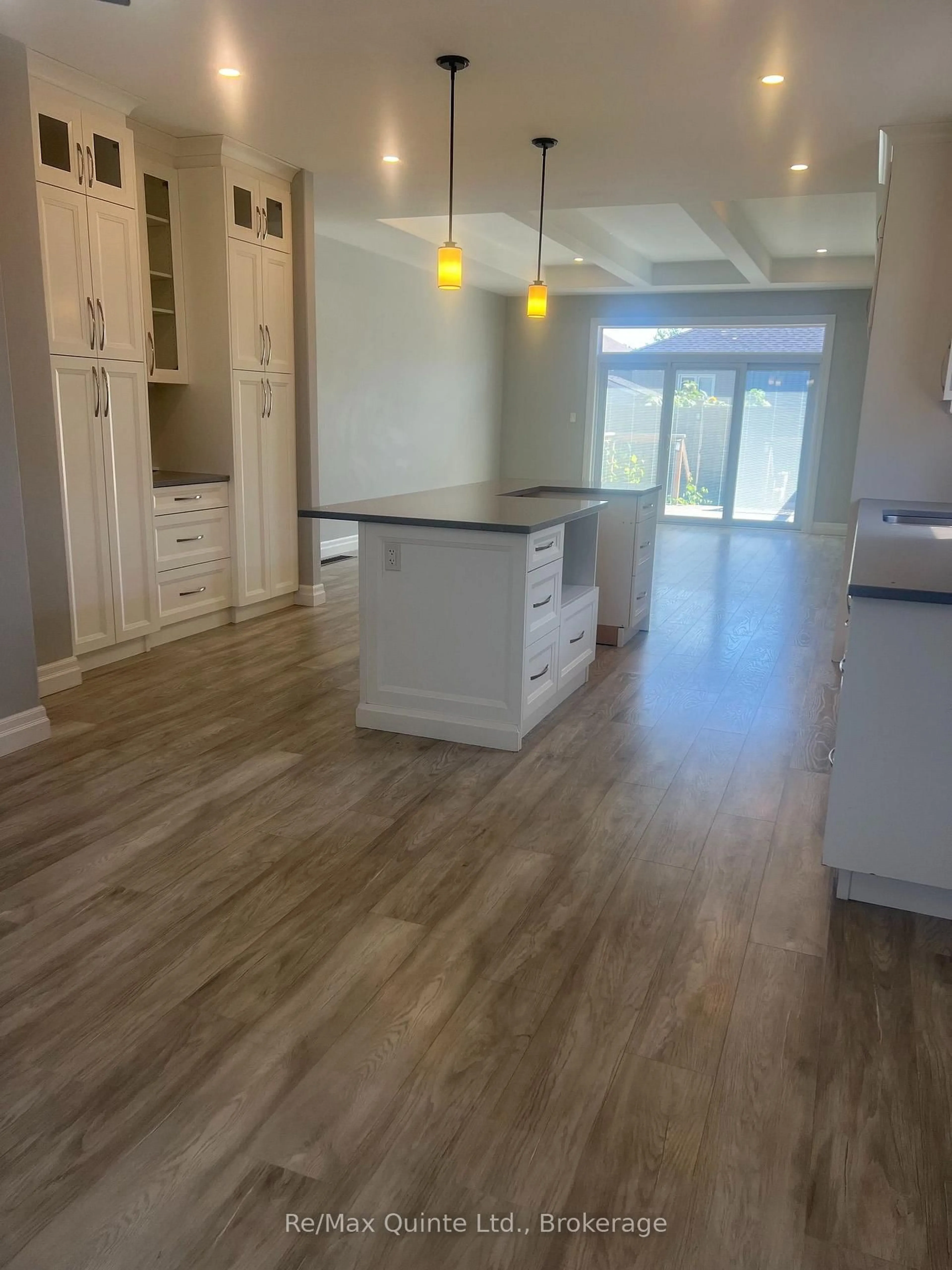Open concept kitchen, wood/laminate floor for 29 Gavin Cres, Quinte West Ontario K8V 0H2
