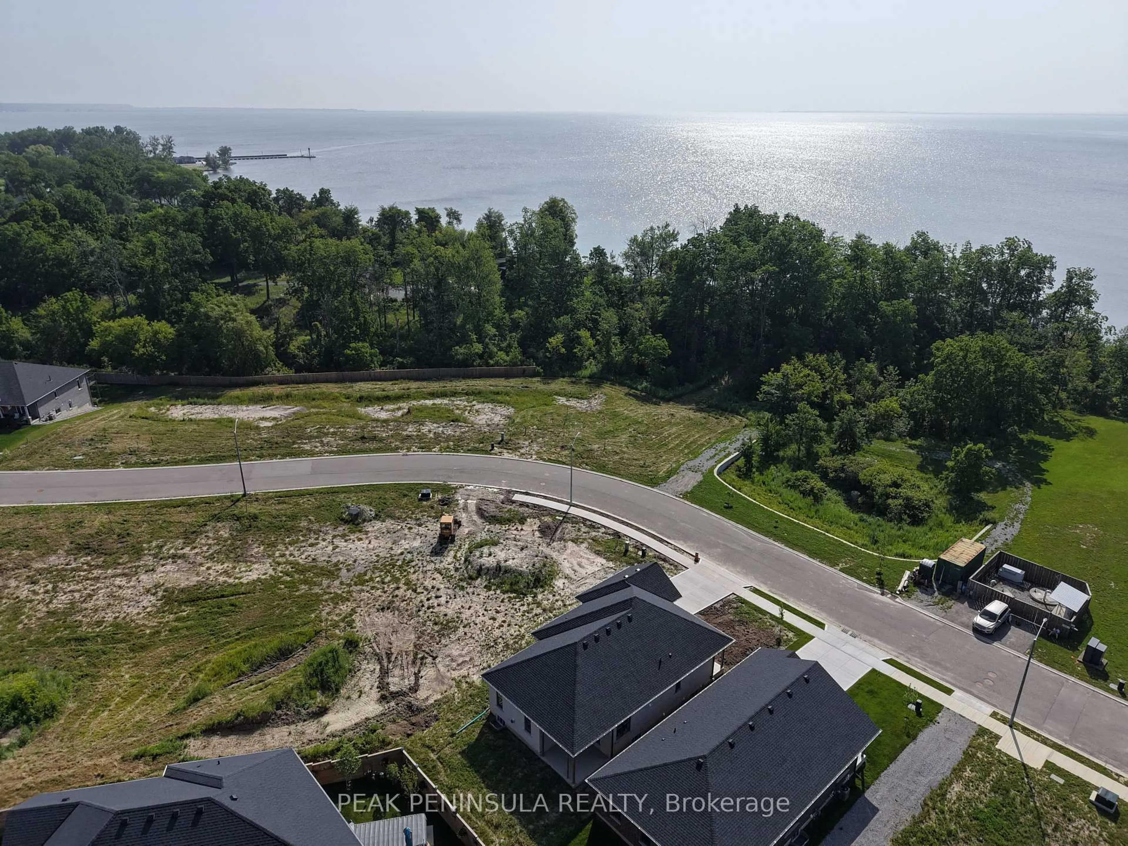 A pic from outside/outdoor area/front of a property/back of a property/a pic from drone, water/lake/river/ocean view for 50 Hunter Dr, Norfolk Ontario N0E 1M0