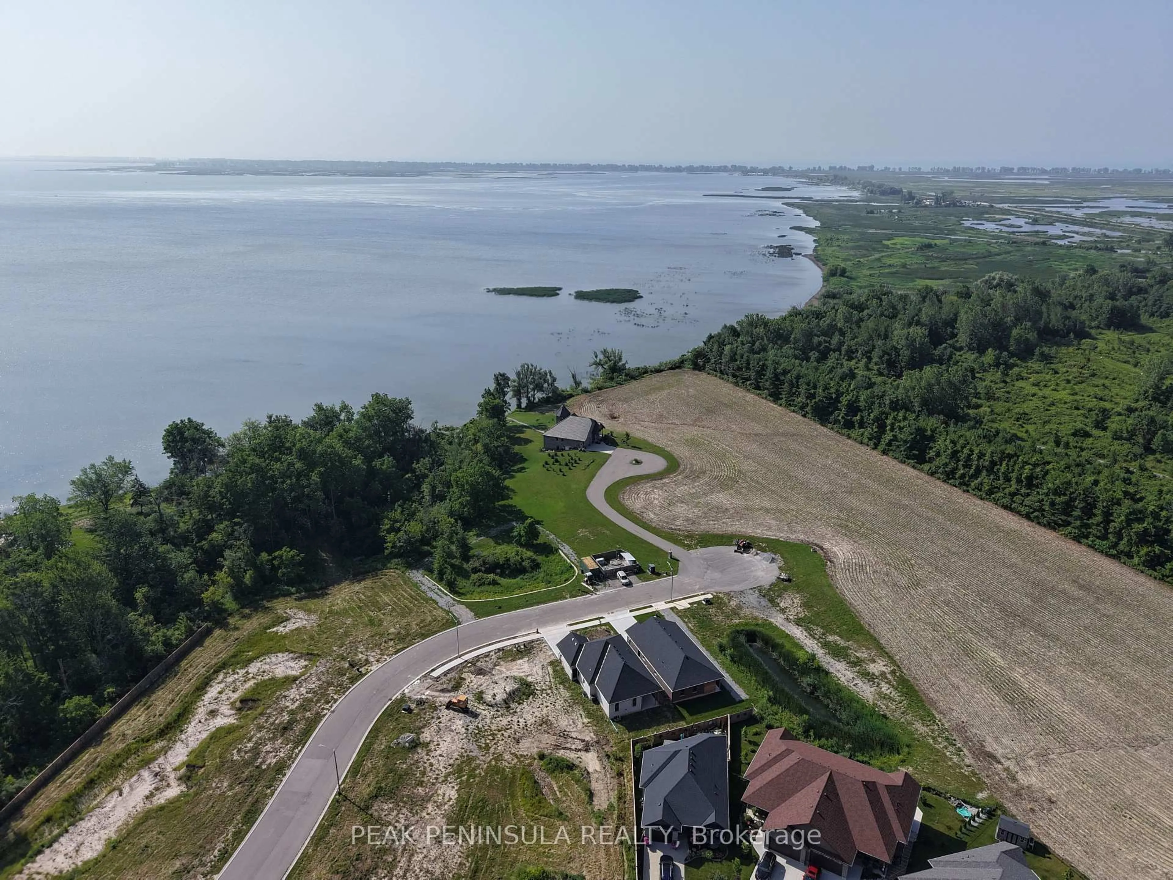 A pic from outside/outdoor area/front of a property/back of a property/a pic from drone, water/lake/river/ocean view for 50 Hunter Dr, Norfolk Ontario N0E 1M0