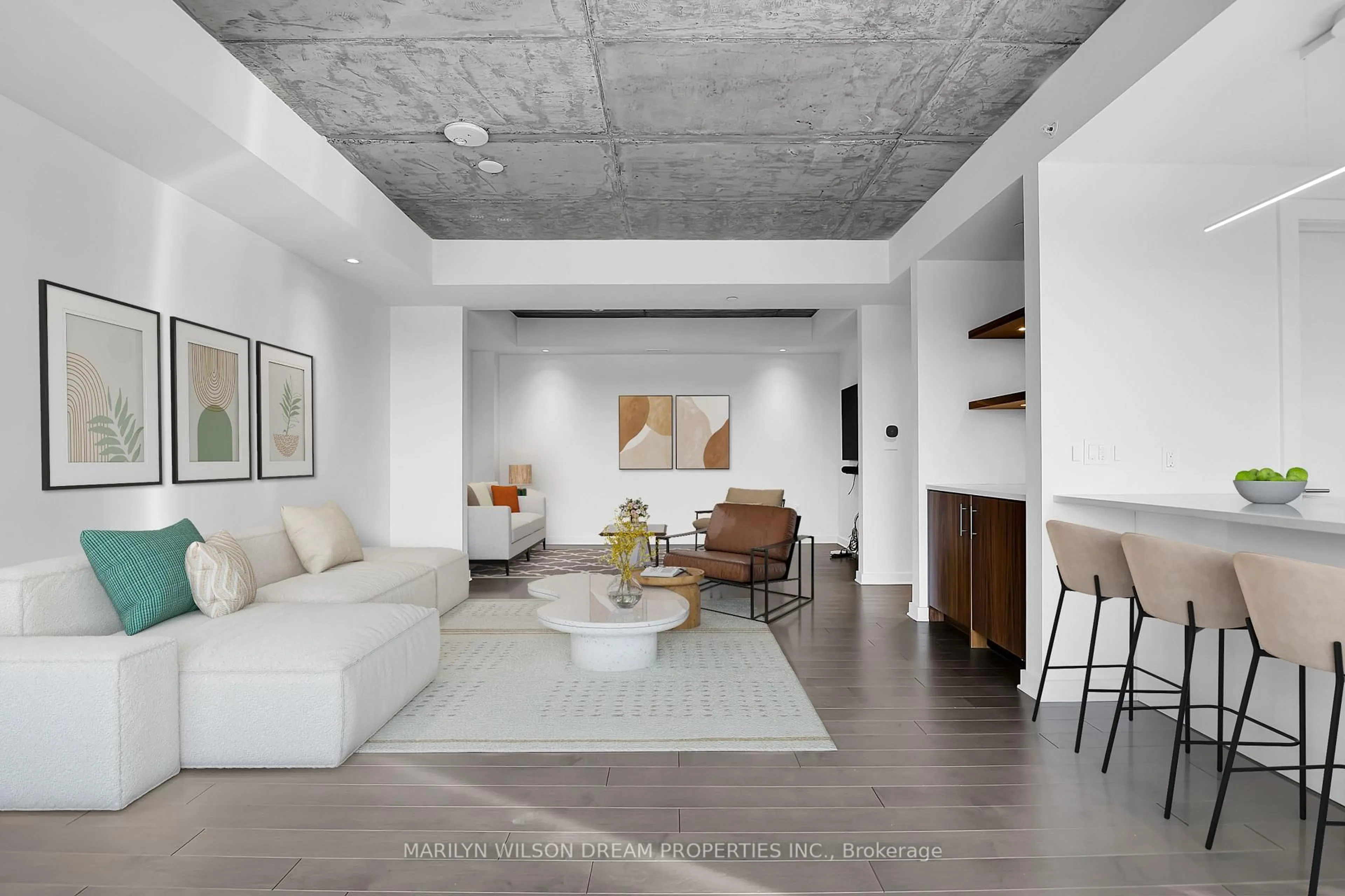 Living room with furniture, cement floor for 135 Barrette St #601, Ottawa Ontario K1L 7Z9