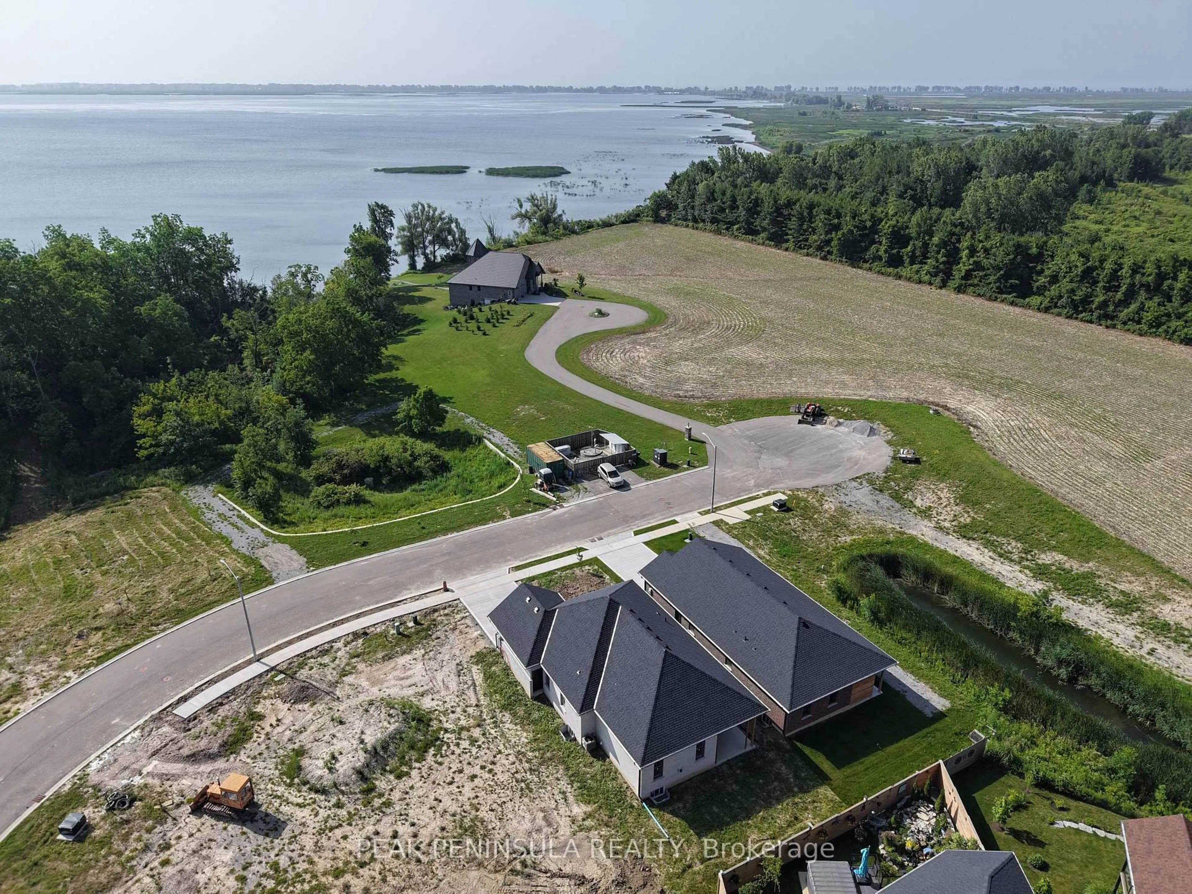 A pic from outside/outdoor area/front of a property/back of a property/a pic from drone, water/lake/river/ocean view for 51 Hunter Dr, Norfolk Ontario N0E 1M0