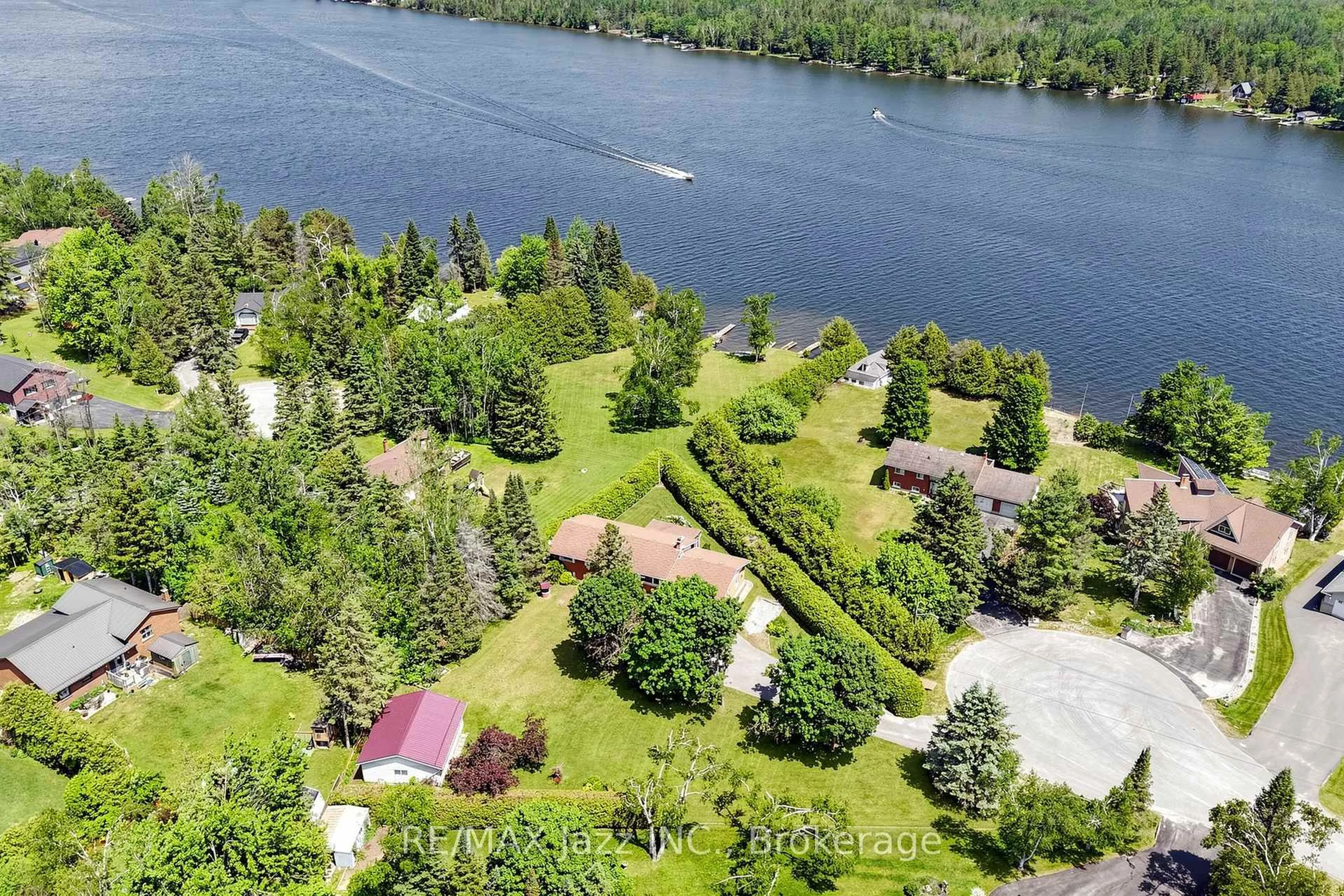 A pic from outside/outdoor area/front of a property/back of a property/a pic from drone, water/lake/river/ocean view for 15 Beavers Lane, Kawartha Lakes Ontario K0M 2T0