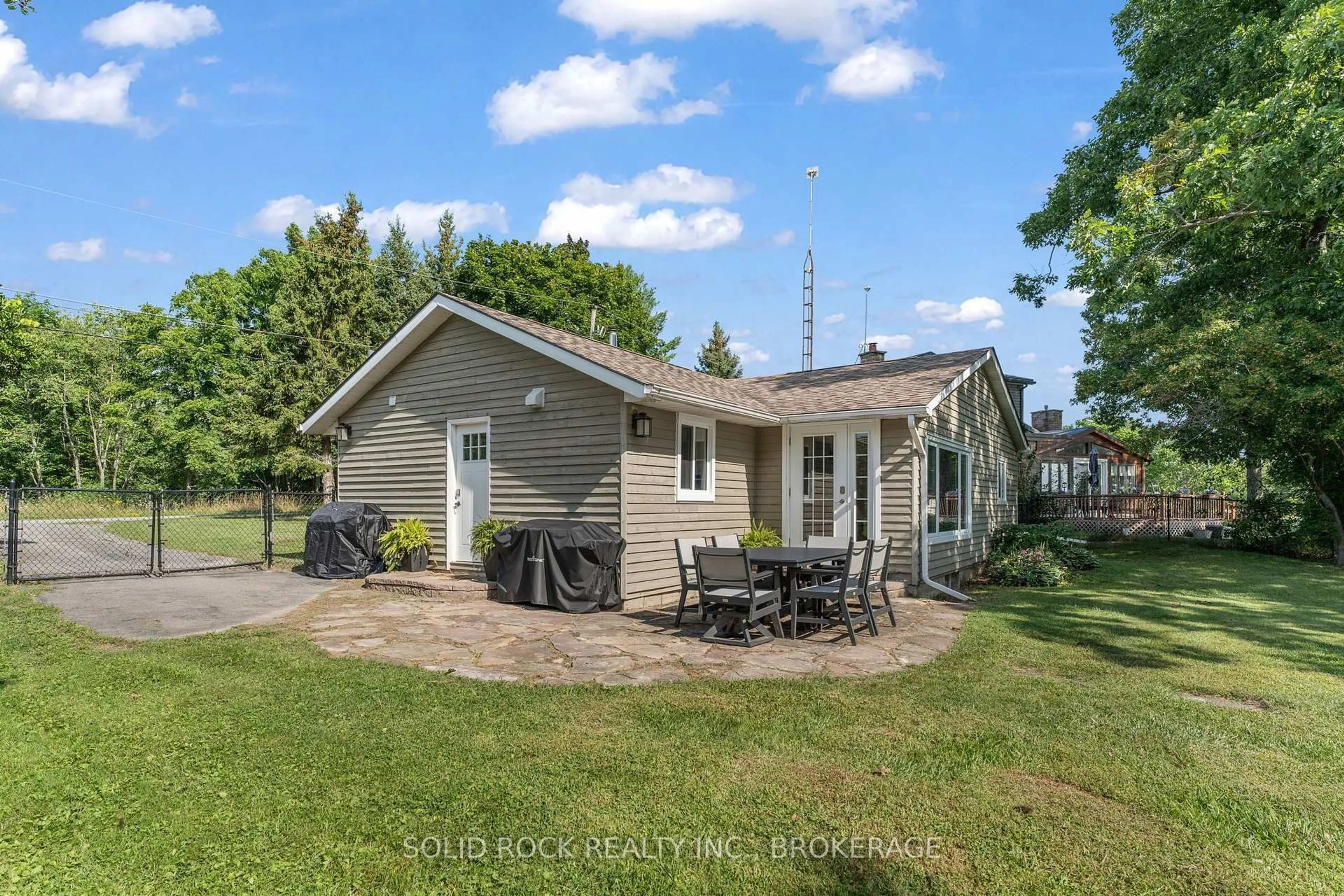 A pic from outside/outdoor area/front of a property/back of a property/a pic from drone, unknown for 65 Blue Heron Lane, Gananoque Ontario K7G 2V6