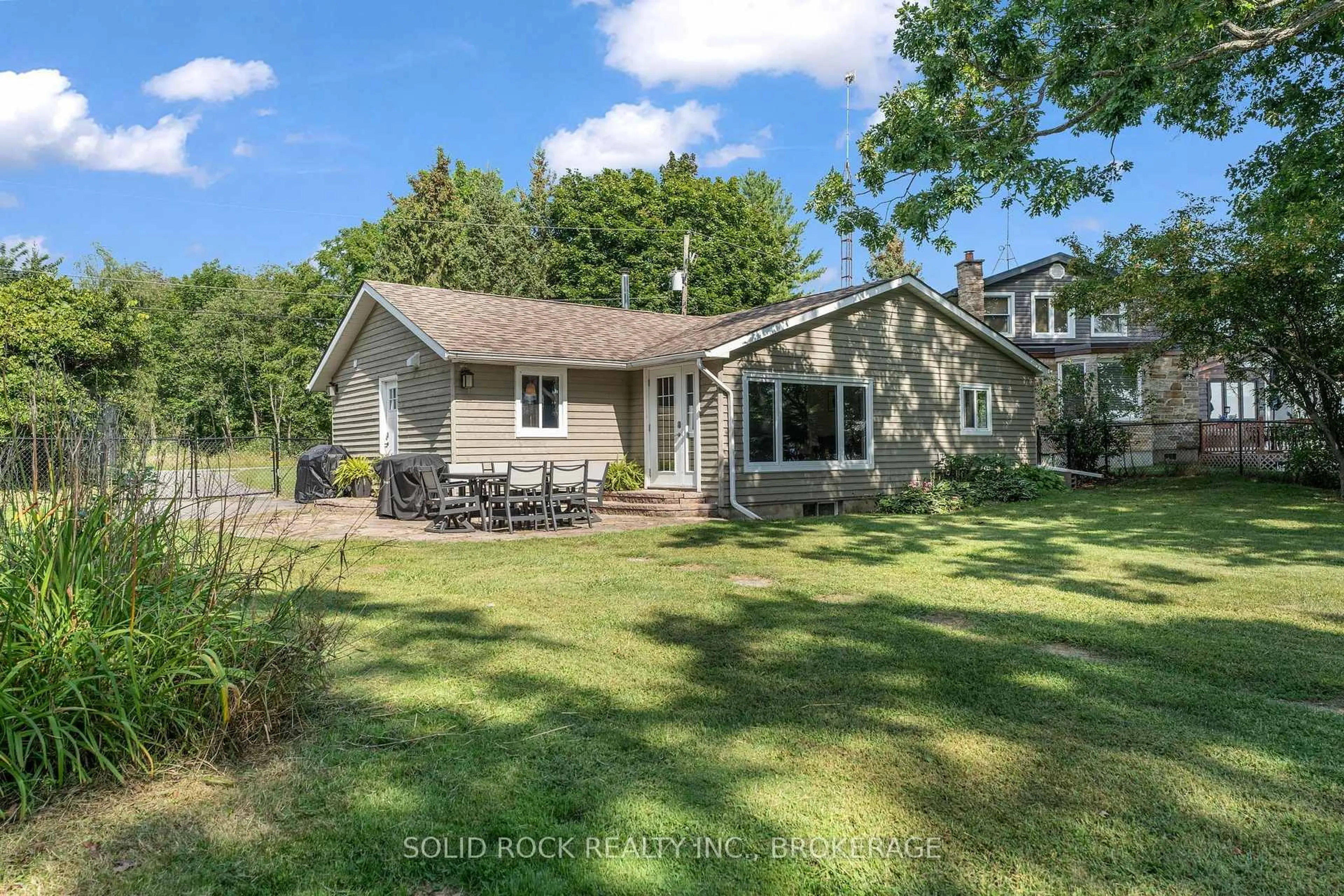 A pic from outside/outdoor area/front of a property/back of a property/a pic from drone, water/lake/river/ocean view for 65 Blue Heron Lane, Gananoque Ontario K7G 2V6