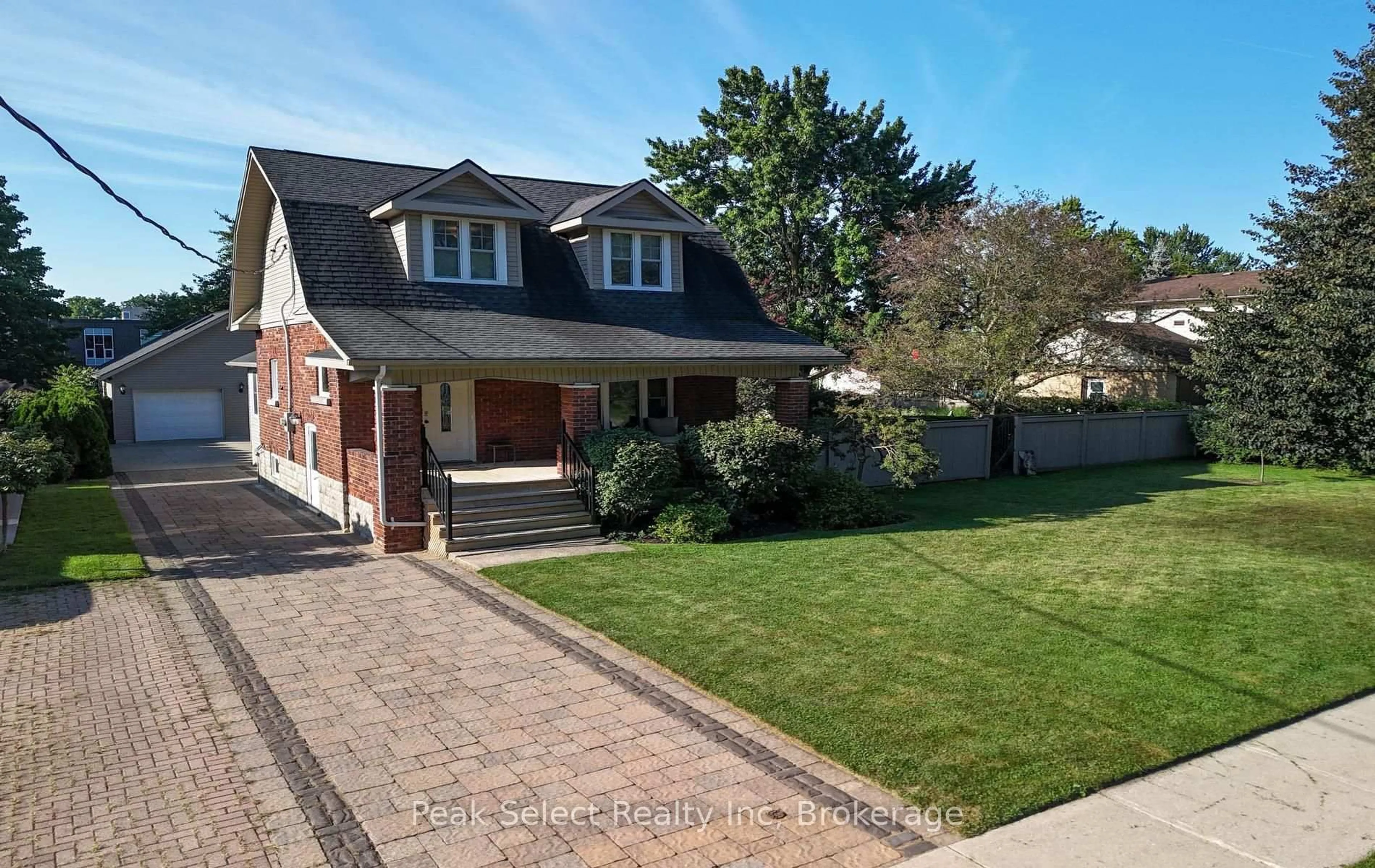 Home with brick exterior material, street for 318 Elizabeth St, St. Marys Ontario N4X 1C8