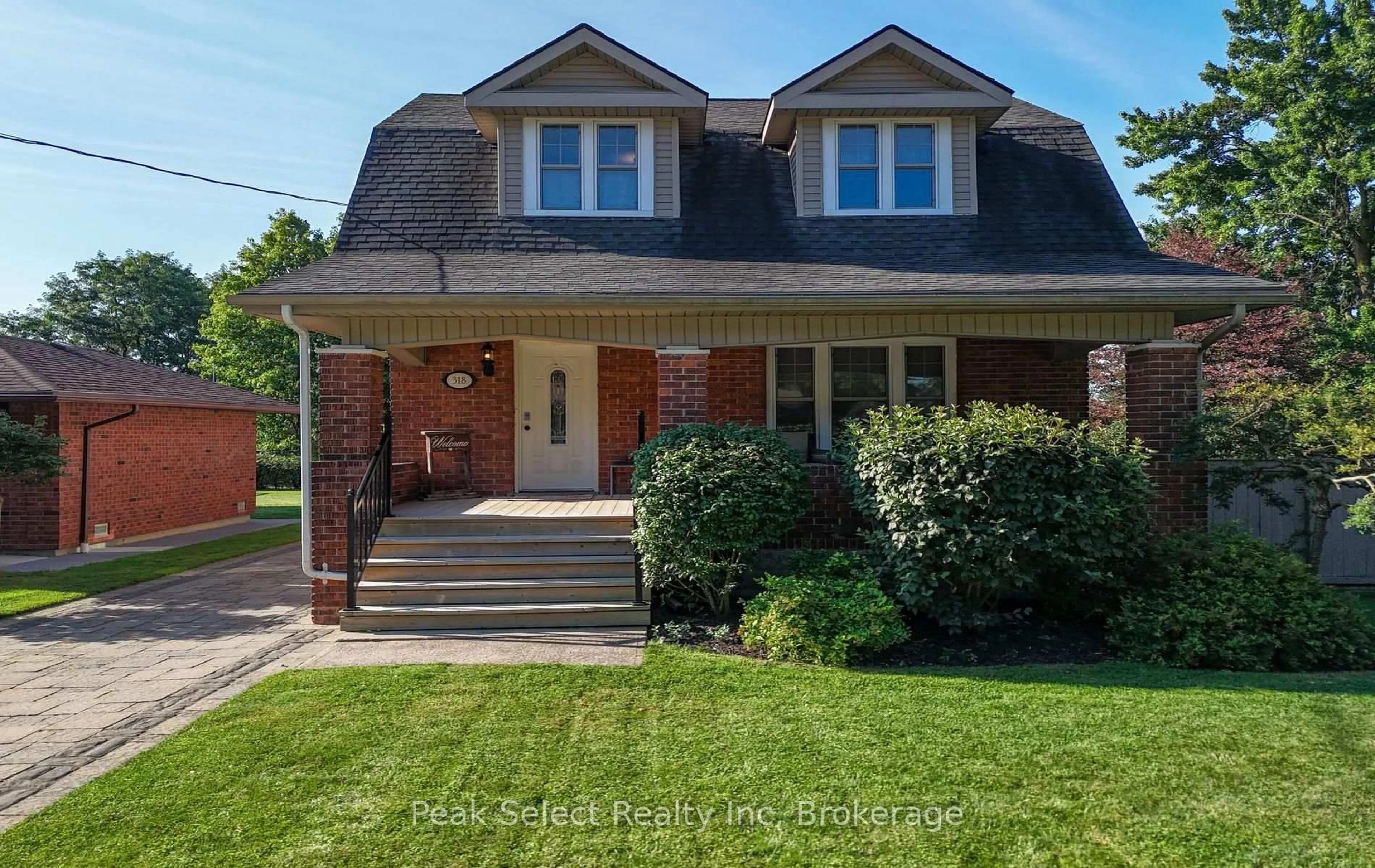 Home with brick exterior material, street for 318 Elizabeth St, St. Marys Ontario N4X 1C8