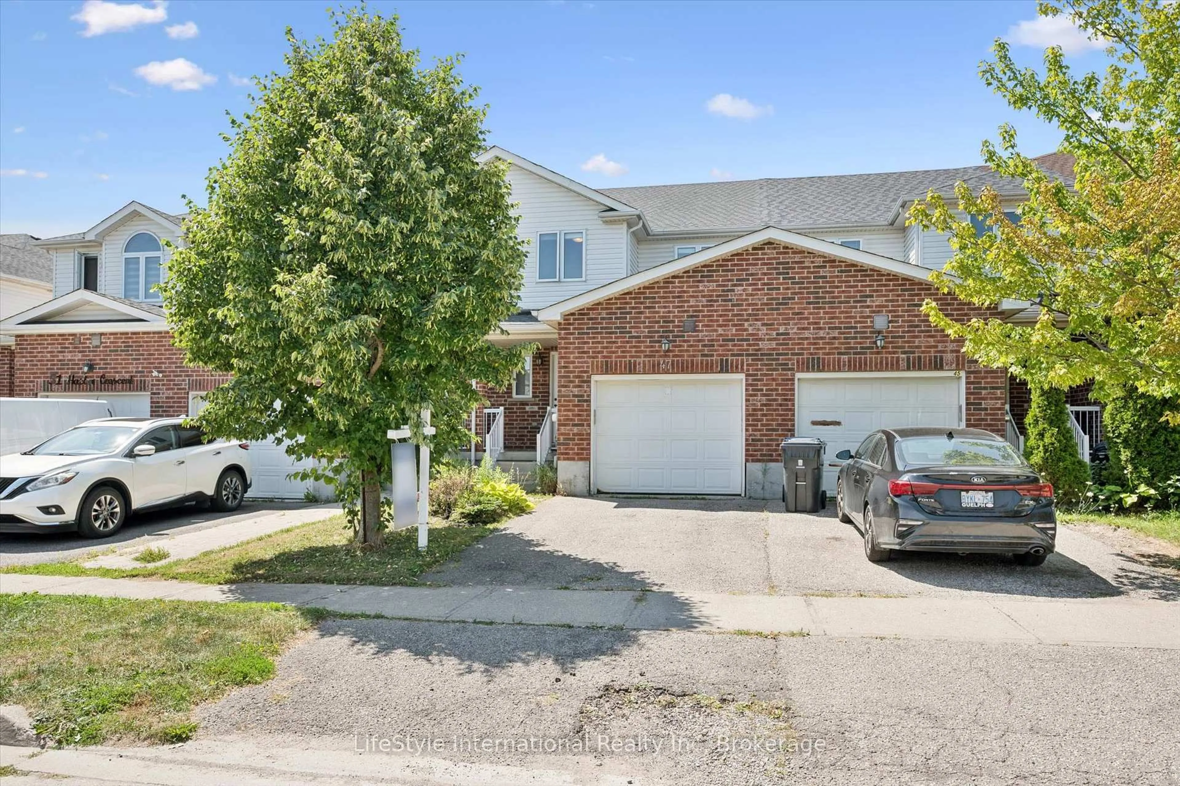 A pic from outside/outdoor area/front of a property/back of a property/a pic from drone, street for 47 HASLER Cres, Guelph Ontario N1L 1A2