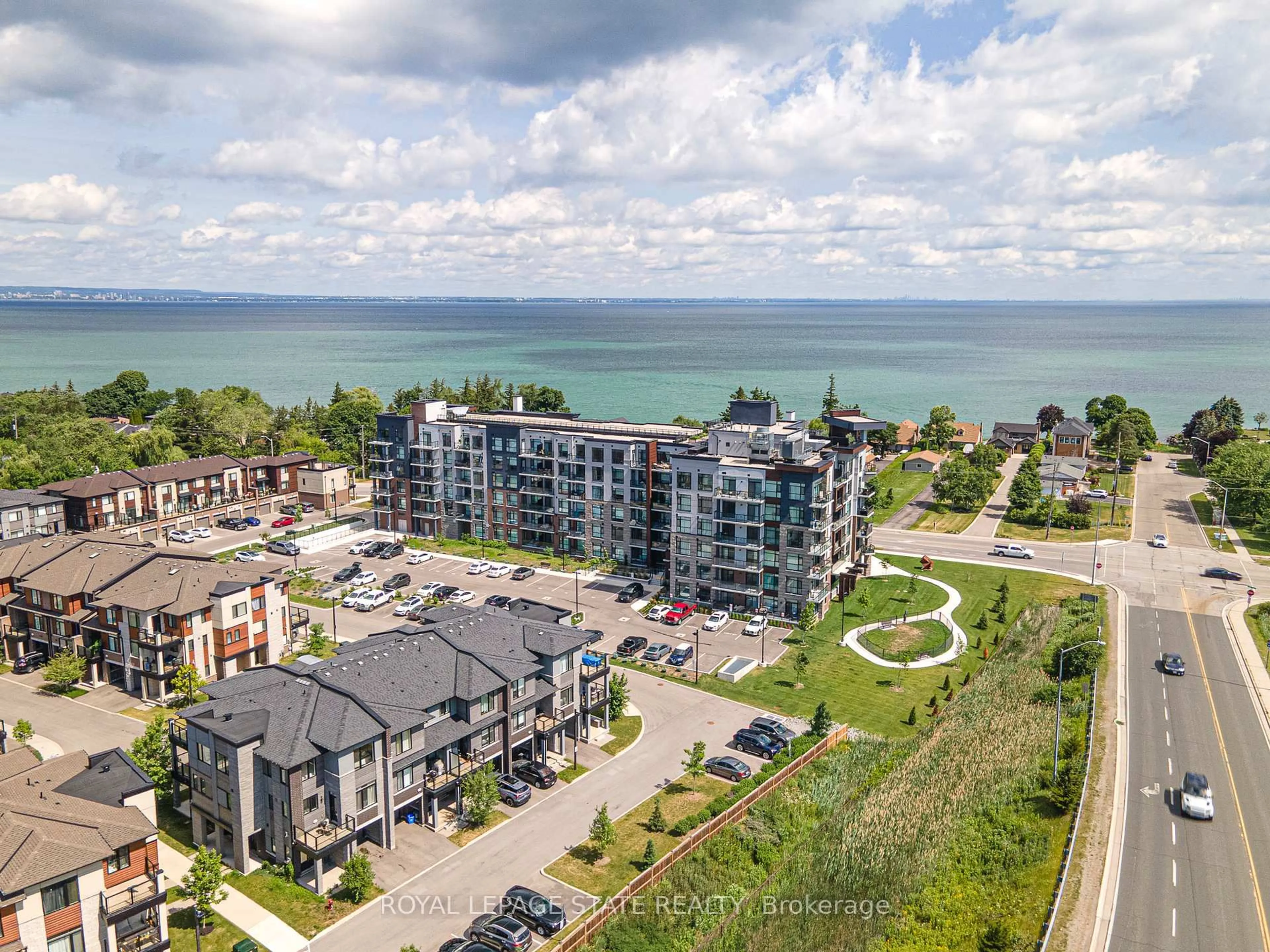 A pic from outside/outdoor area/front of a property/back of a property/a pic from drone, water/lake/river/ocean view for 600 North Service Rd #301, Hamilton Ontario L8E 0L2