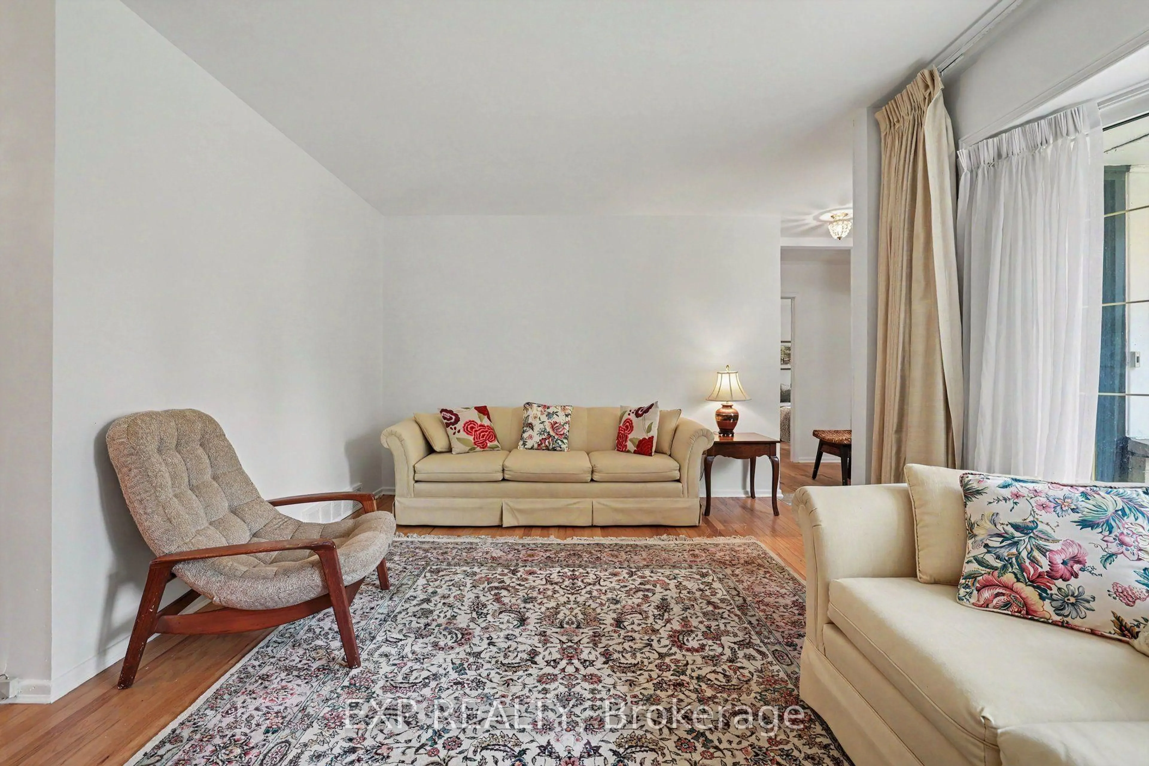 Living room with furniture, carpet floor for 16 Elmsley Cres, Ottawa Ontario K2H 6V2