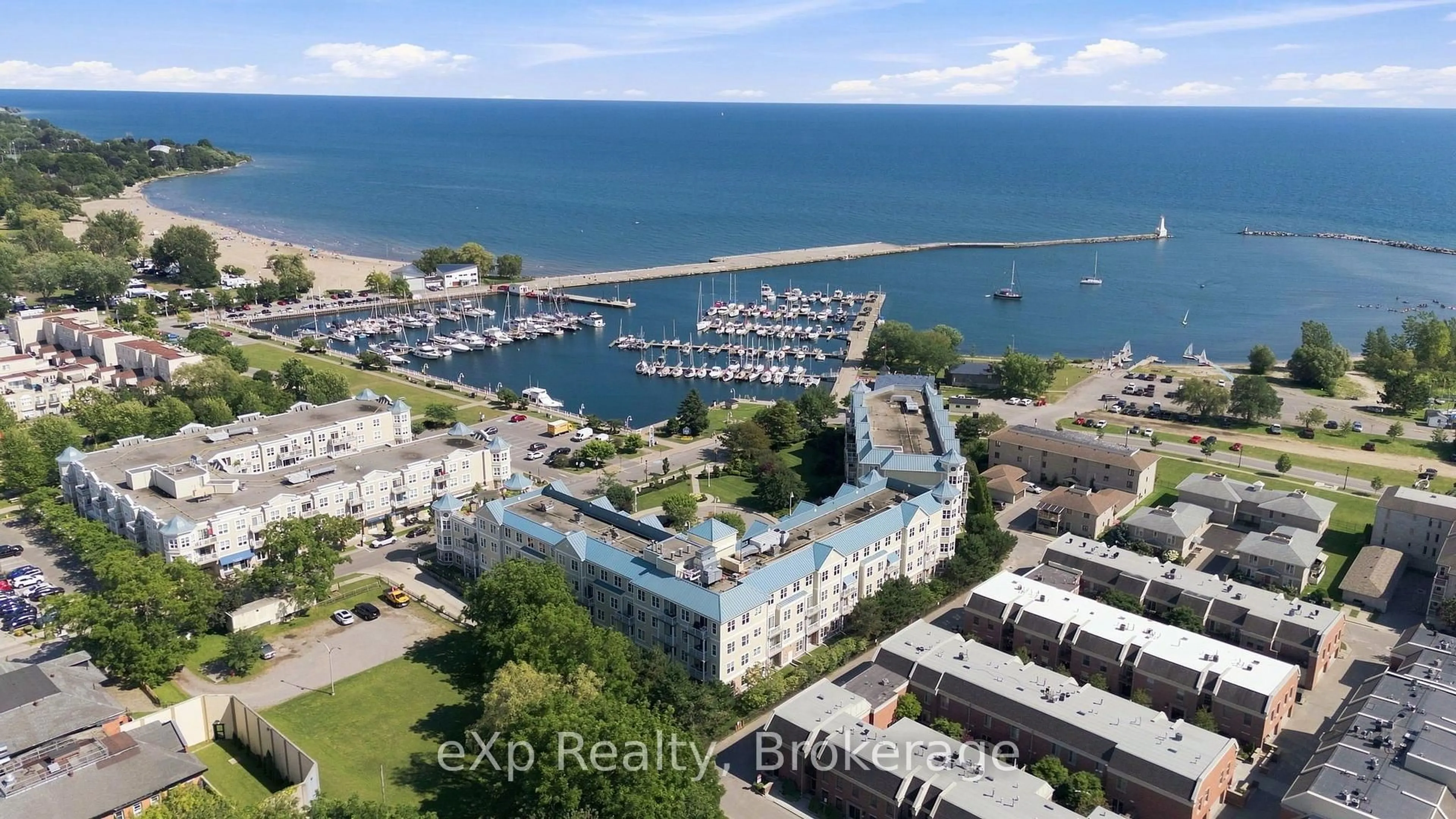 A pic from outside/outdoor area/front of a property/back of a property/a pic from drone, water/lake/river/ocean view for 145 Third St #212, Cobourg Ontario K9A 5X1