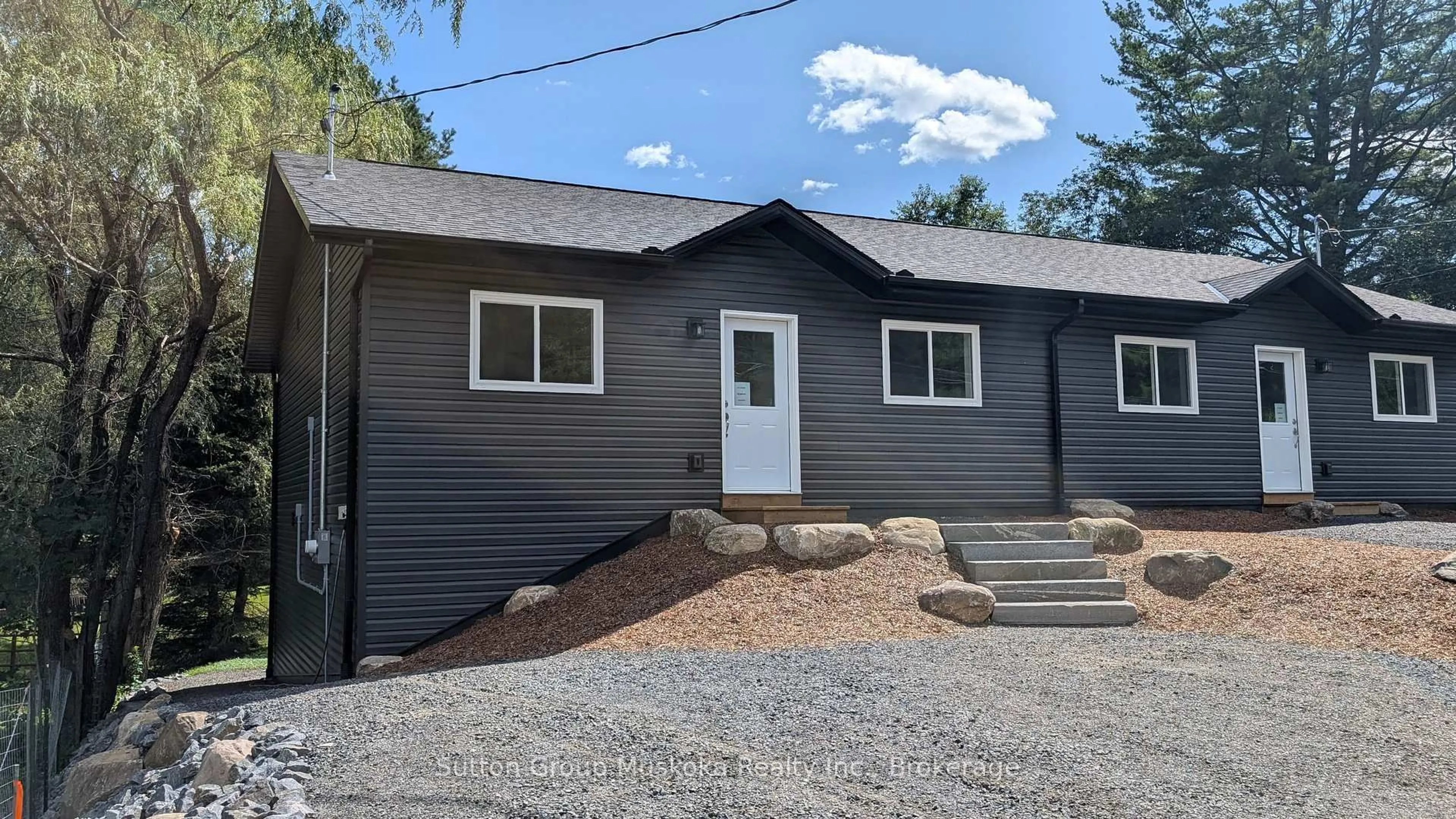Home with vinyl exterior material, street for 81 Chaffey Township Rd, Huntsville Ontario P1H 1C8