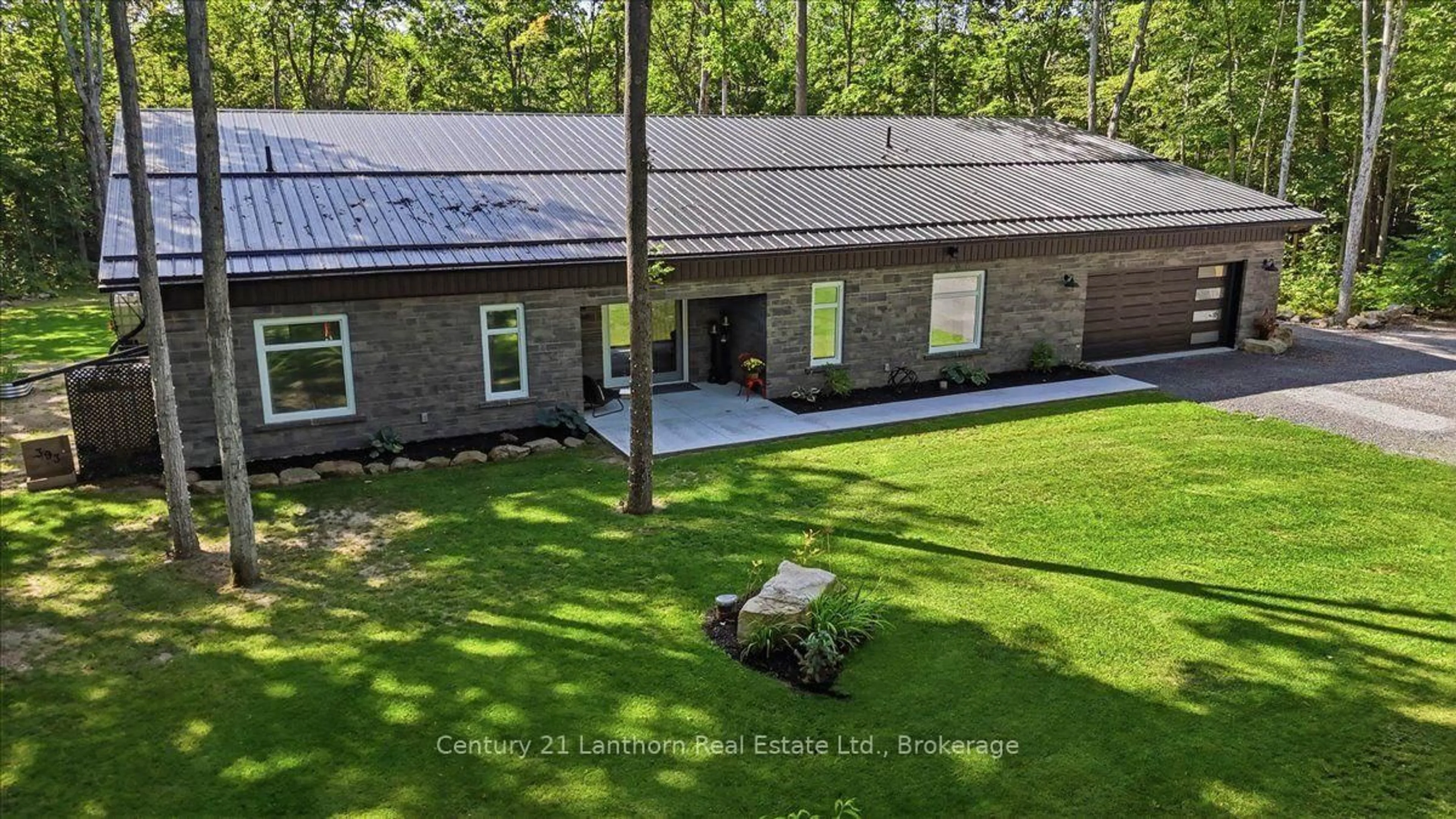 A pic from outside/outdoor area/front of a property/back of a property/a pic from drone, building for 393 Wood Rd, Madoc Ontario K0K 2K0