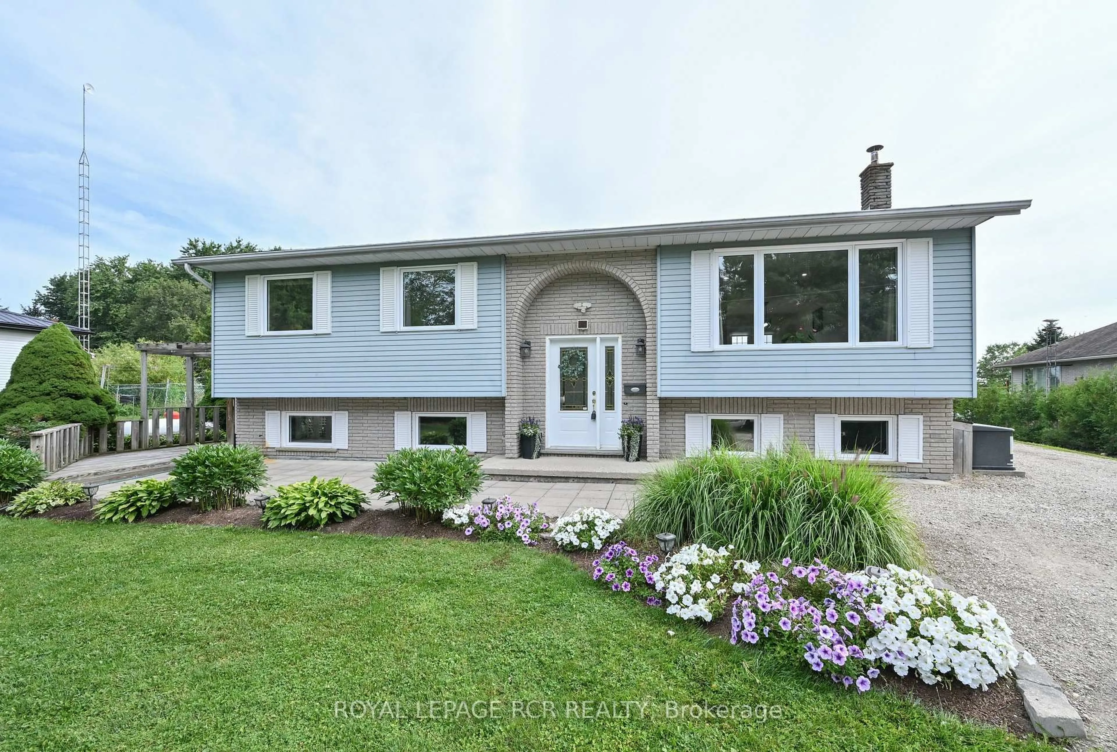 Home with vinyl exterior material, street for 9493 Maas Park Dr, Wellington North Ontario N0G 2L0