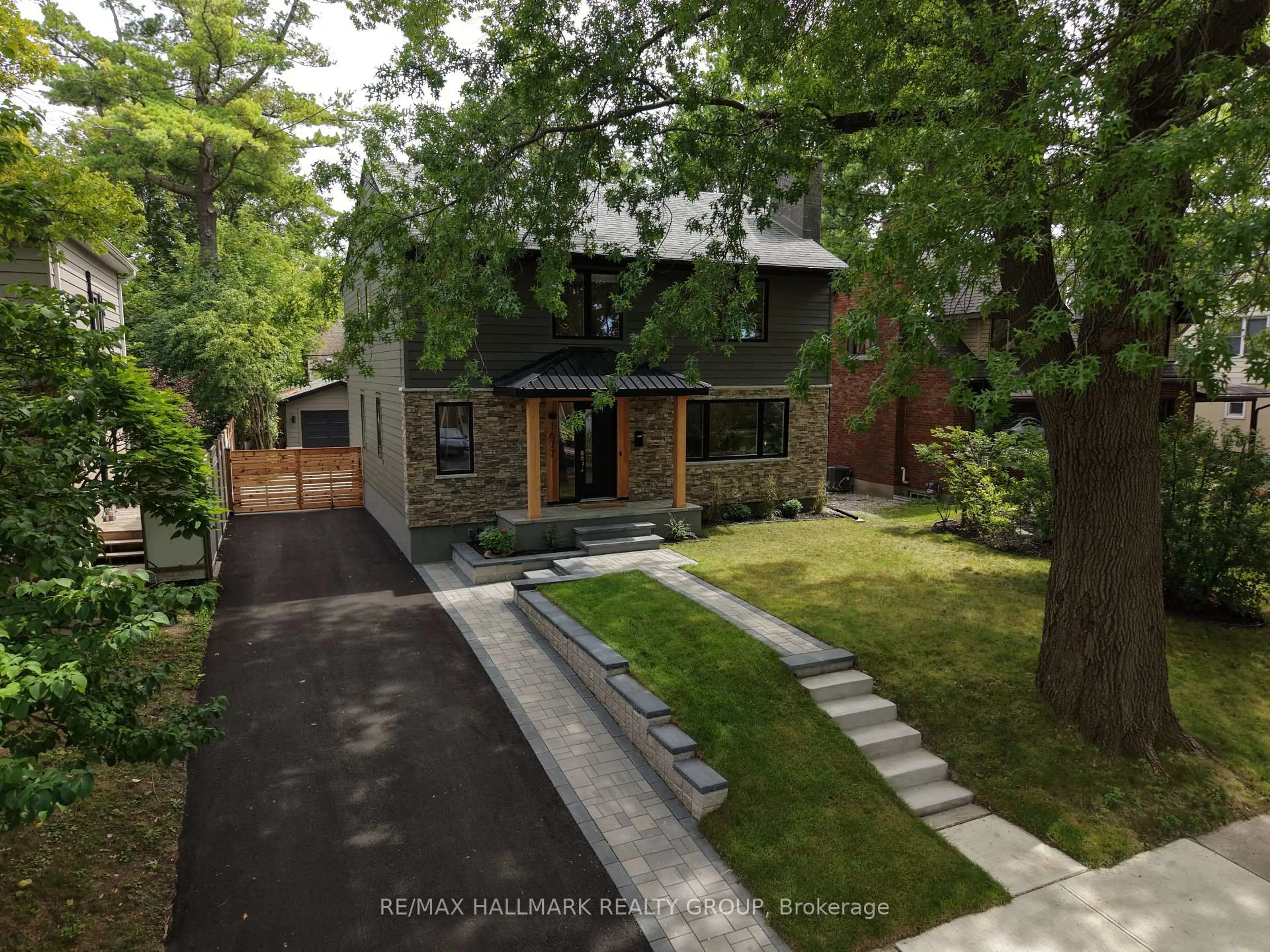Home with brick exterior material, street for 1677 Abbey Rd, Ottawa Ontario K1G 0H4