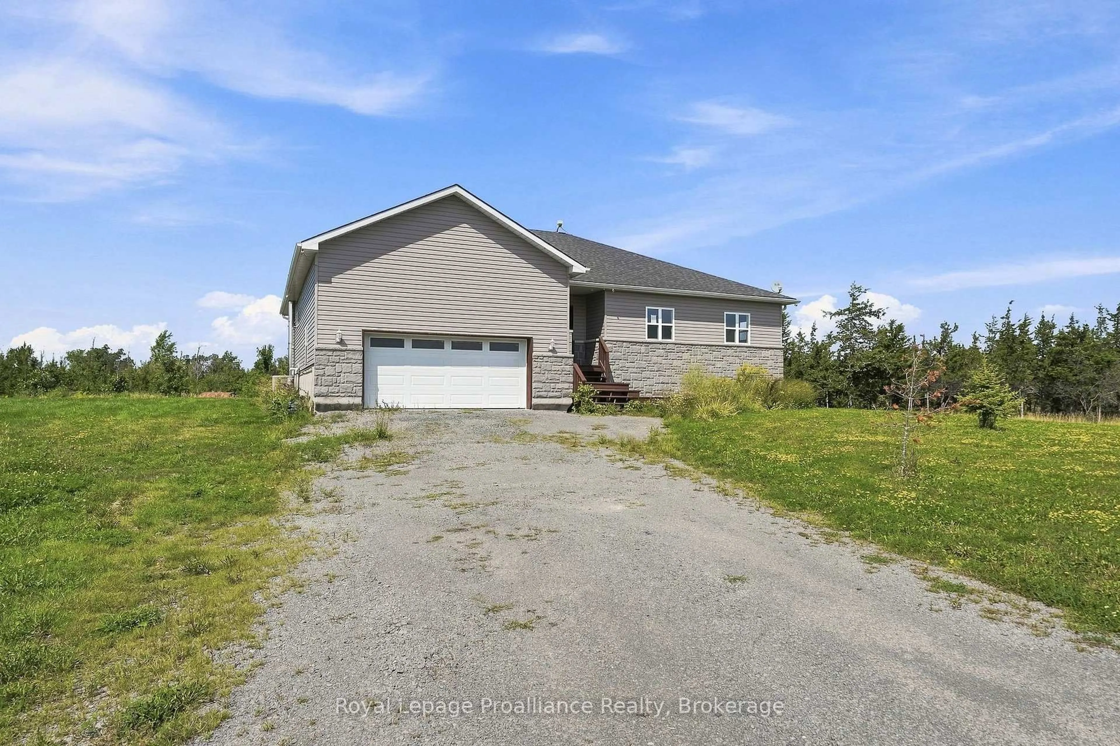 A pic from outside/outdoor area/front of a property/back of a property/a pic from drone, unknown for 402 Black Rd, Prince Edward County Ontario K0K 1W0