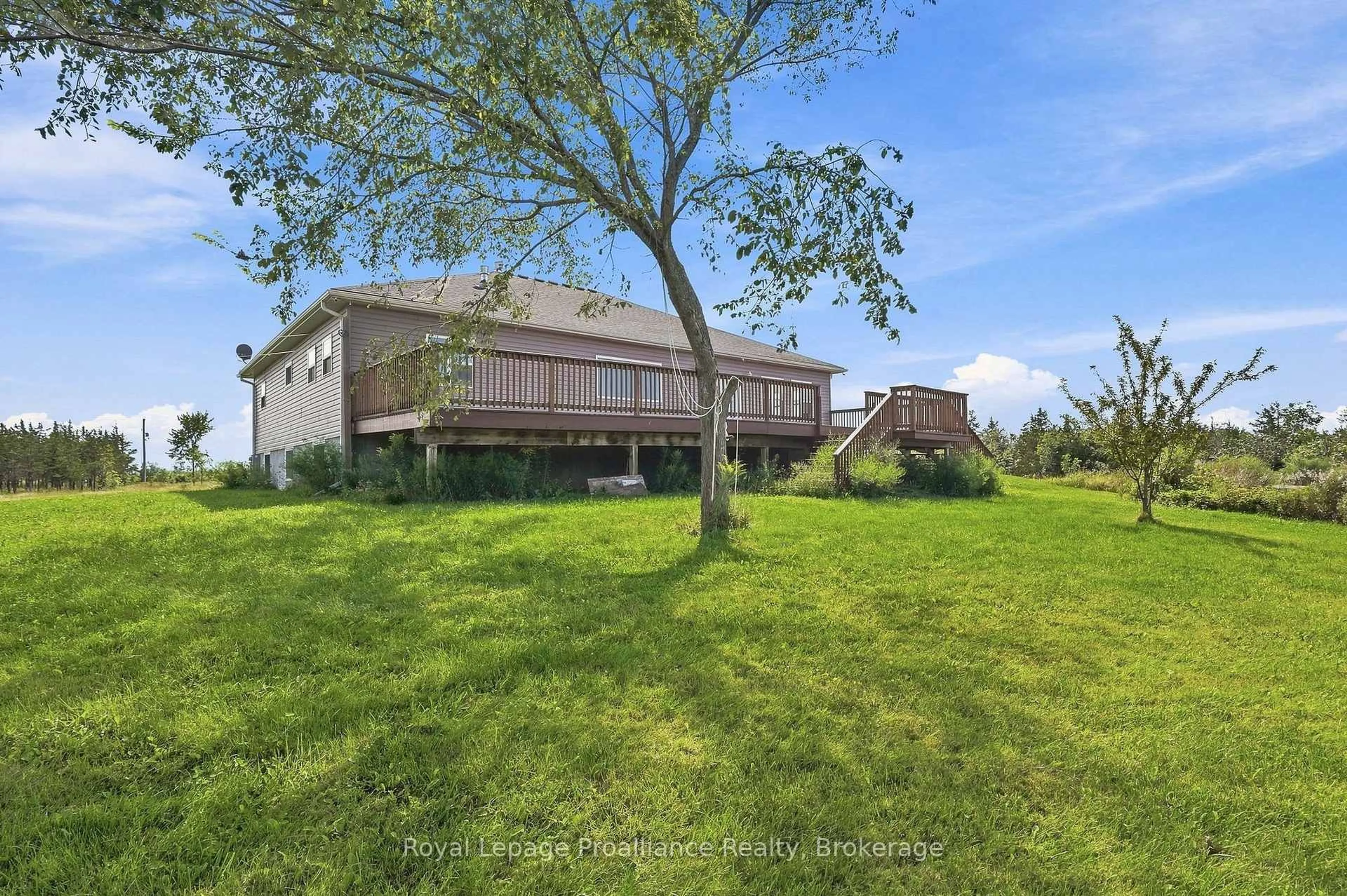 A pic from outside/outdoor area/front of a property/back of a property/a pic from drone, water/lake/river/ocean view for 402 Black Rd, Prince Edward County Ontario K0K 1W0