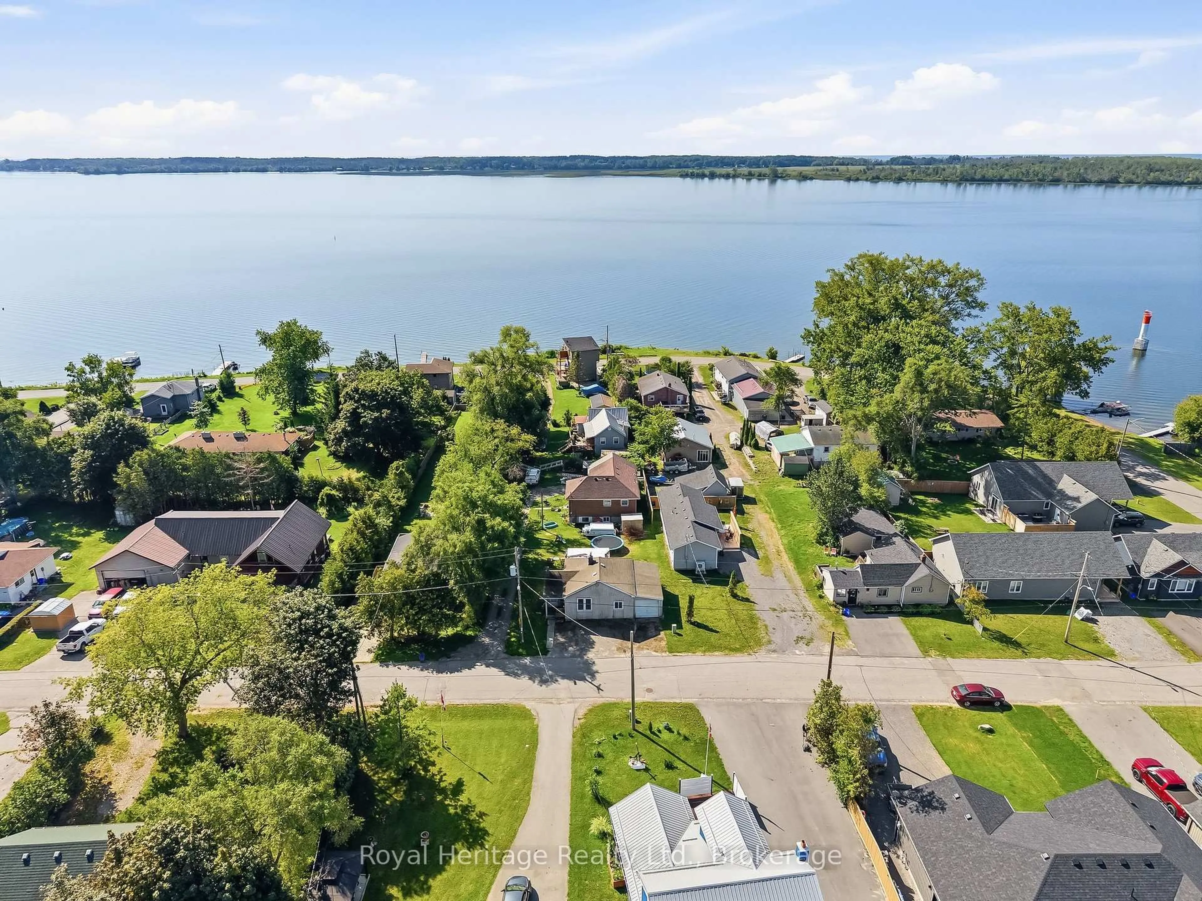 A pic from outside/outdoor area/front of a property/back of a property/a pic from drone, water/lake/river/ocean view for 21 Price St, Brighton Ontario K0K 1H0