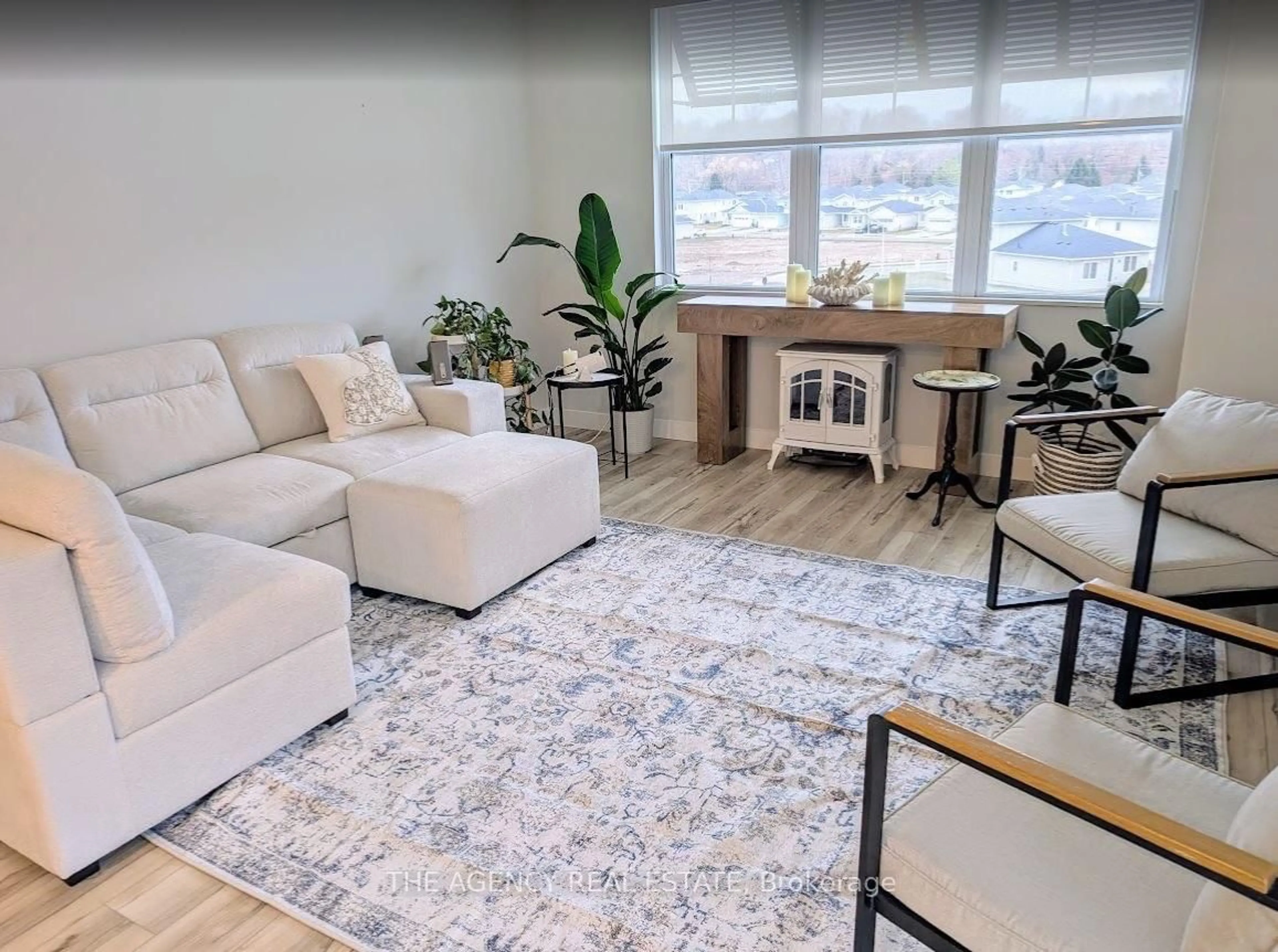 Living room with furniture, unknown for 100 Promenade Circ #401, Central Elgin Ontario N5L 0B7