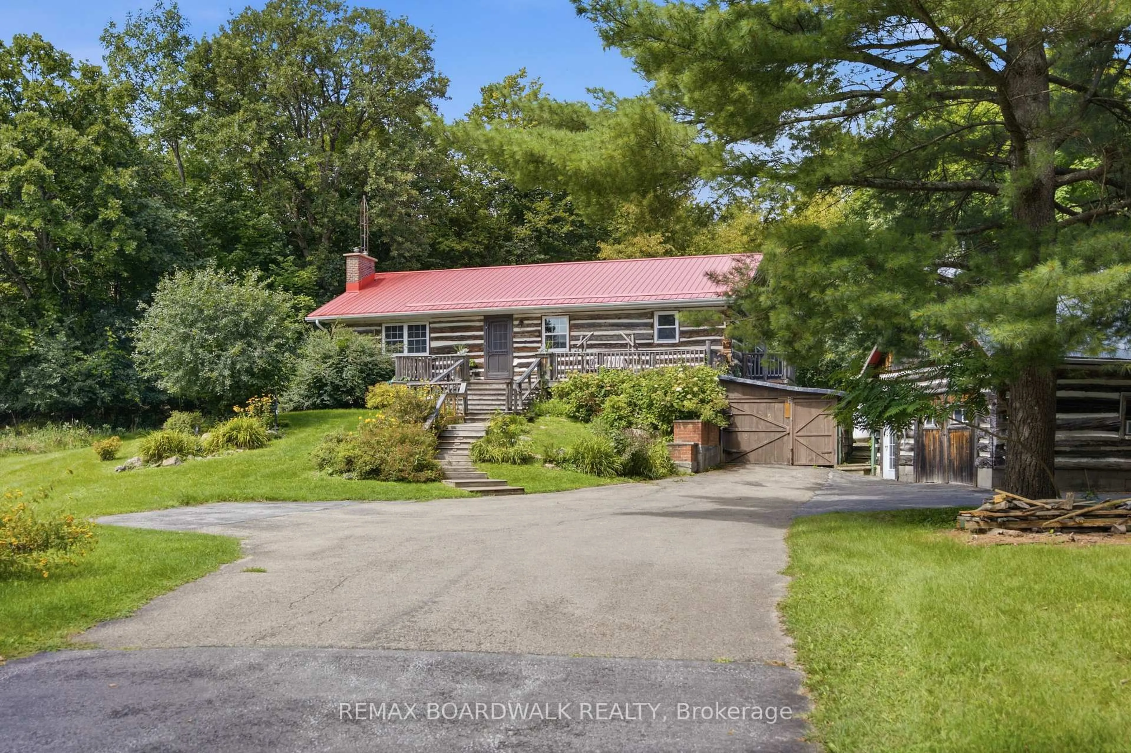 A pic from outside/outdoor area/front of a property/back of a property/a pic from drone, unknown for 394 Kenyon Rd, Perth Ontario K7H 3C5