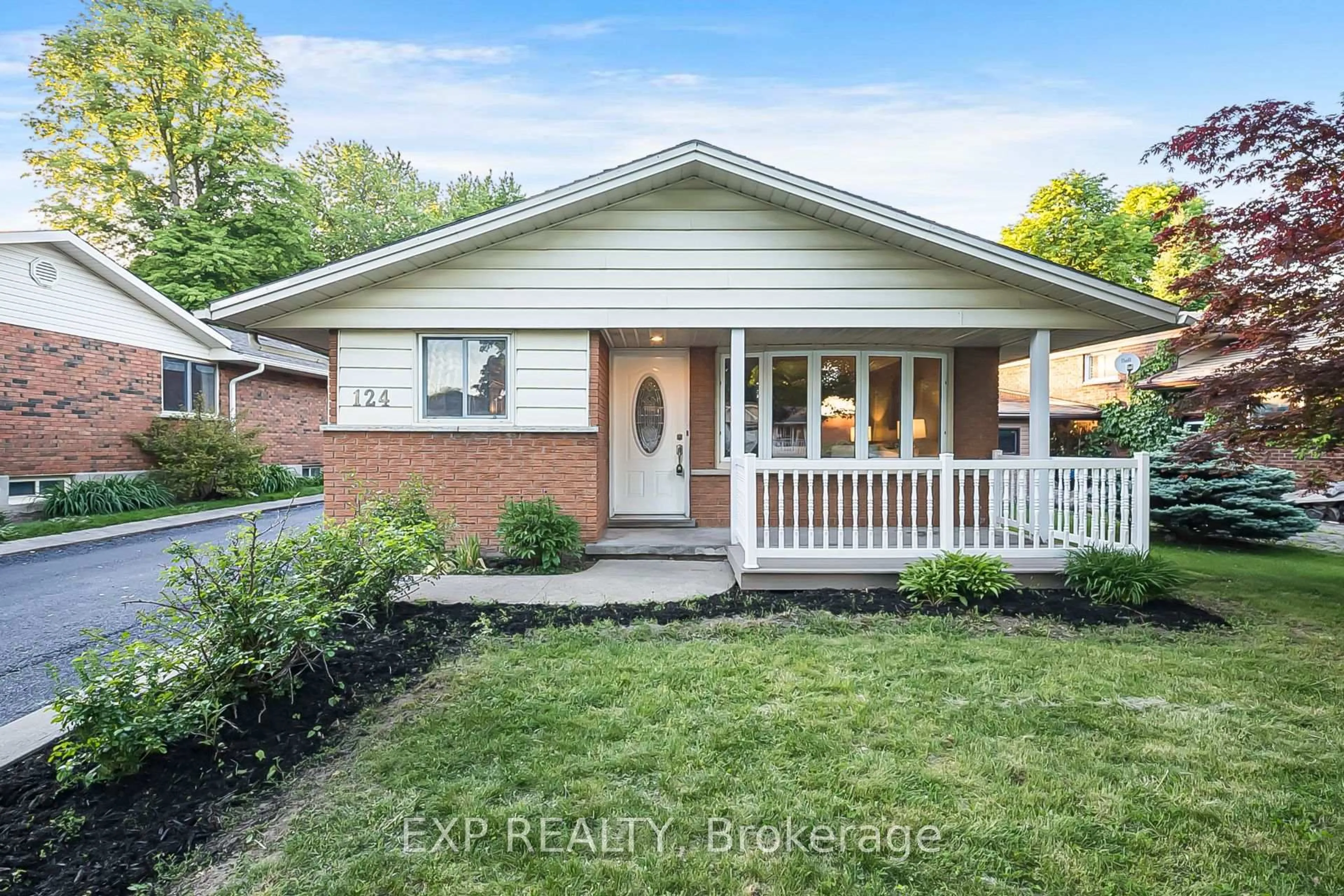 Home with brick exterior material, street for 124 Dunsmere Dr, Kitchener Ontario N2E 1V7