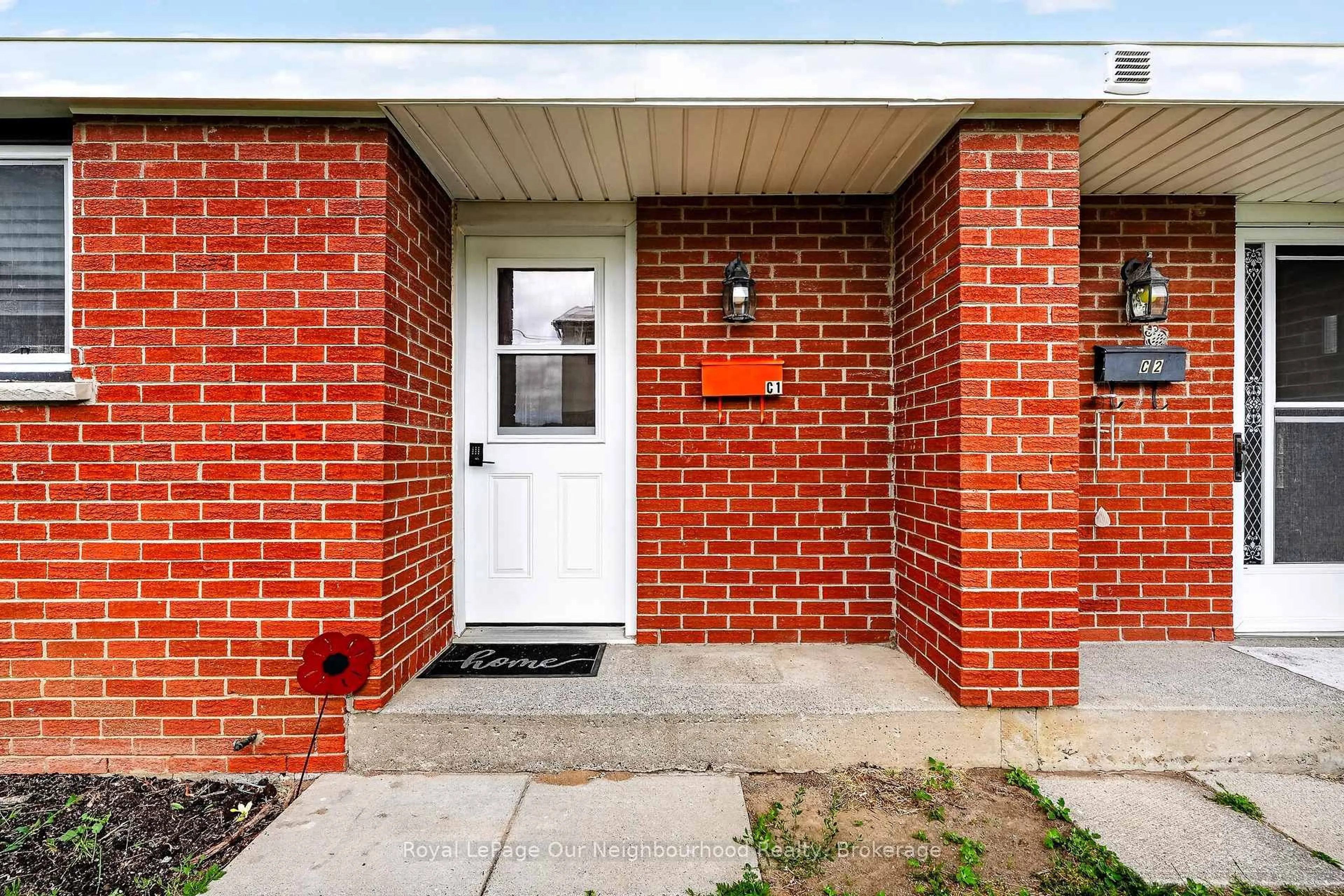 Home with brick exterior material, street for 47 Wellington St #C1, Port Hope Ontario L1A 2M4