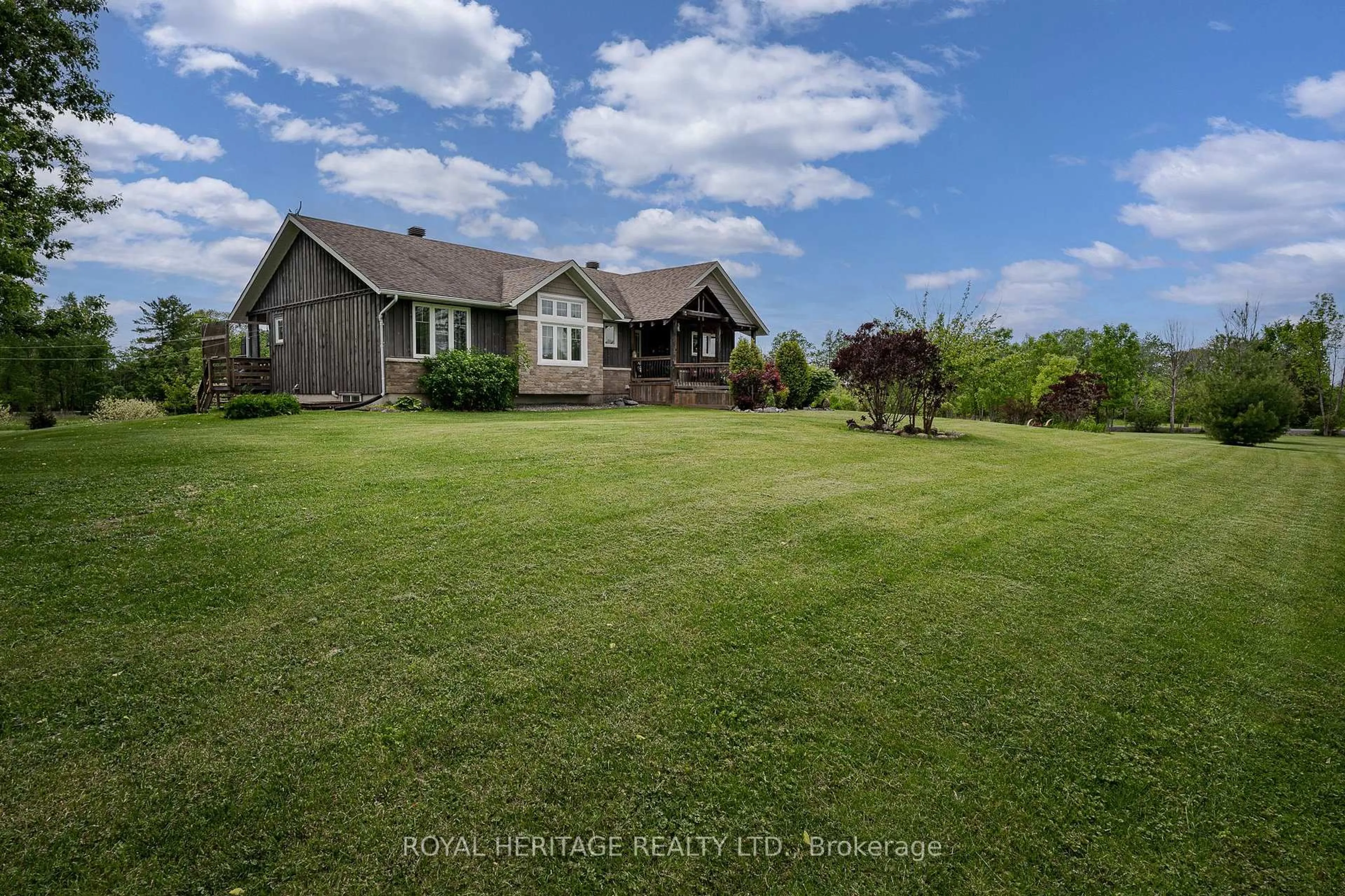 A pic from outside/outdoor area/front of a property/back of a property/a pic from drone, water/lake/river/ocean view for 8096 County Road 2 Rd, Napanee Ontario K7R 3K6