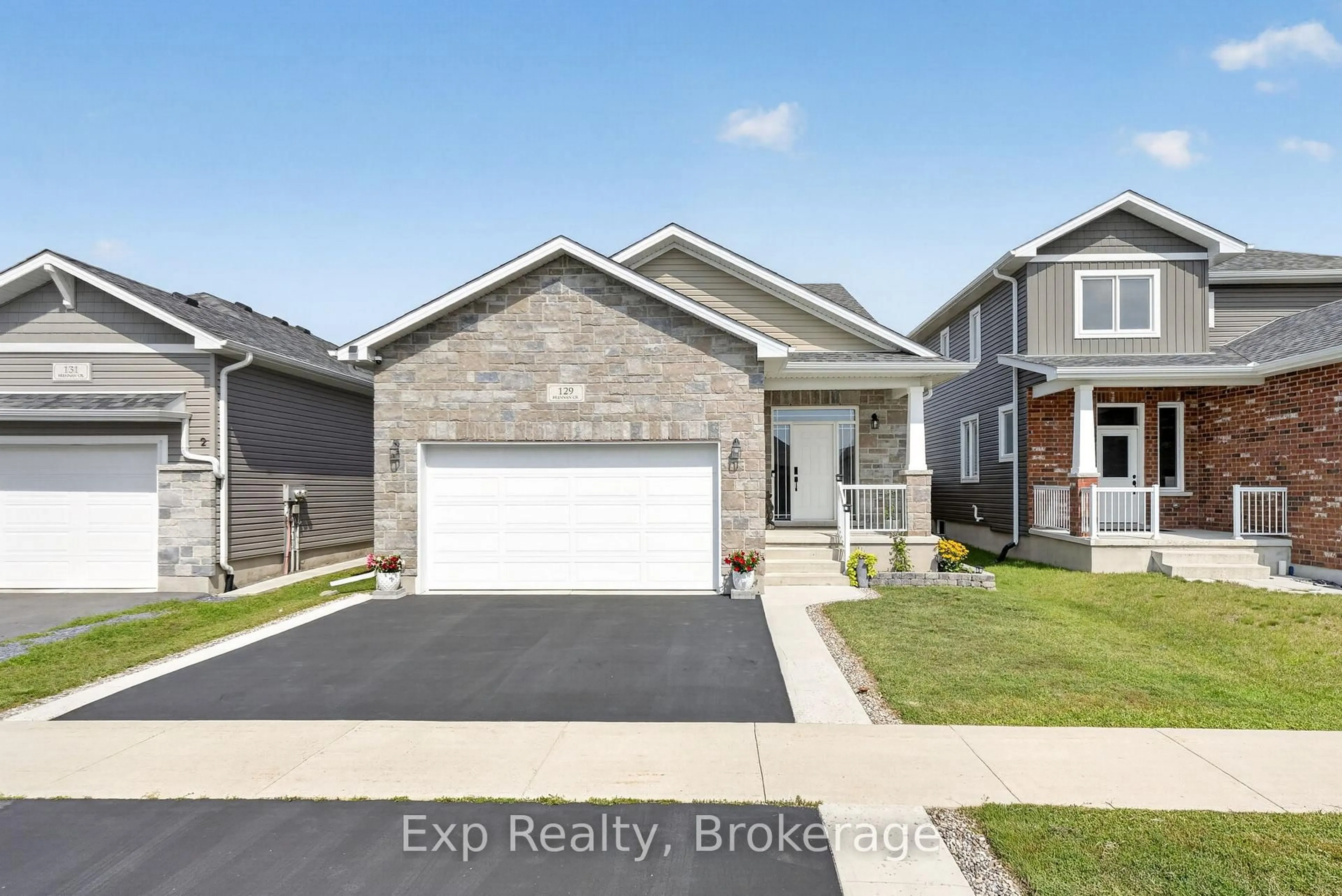 Home with brick exterior material, street for 129 Brennan Cres, Bissett Creek Ontario K0H 2H0