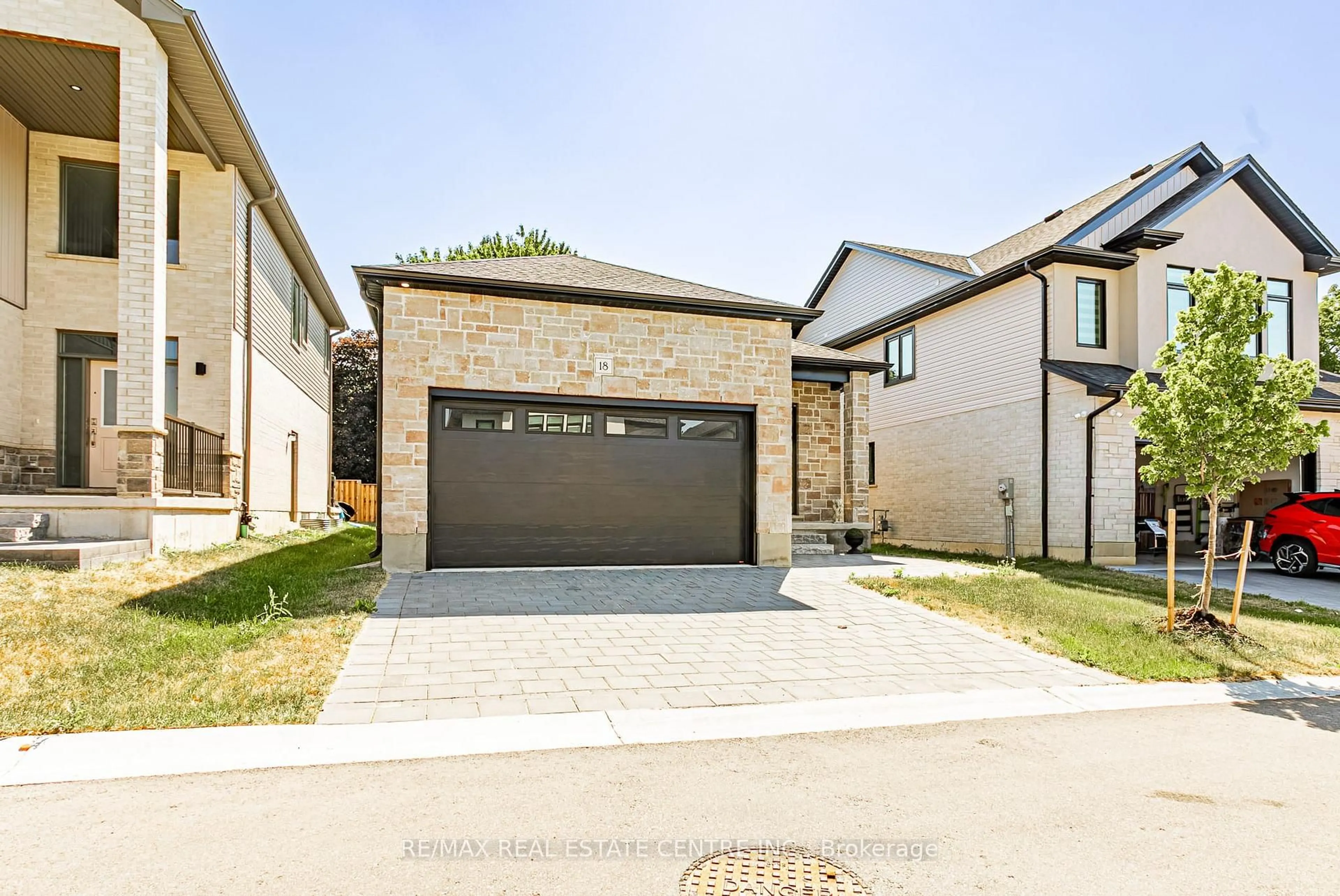 Home with brick exterior material, street for 7966 Fallon Dr #18, Lucan Biddulph Ontario N0M 1V0