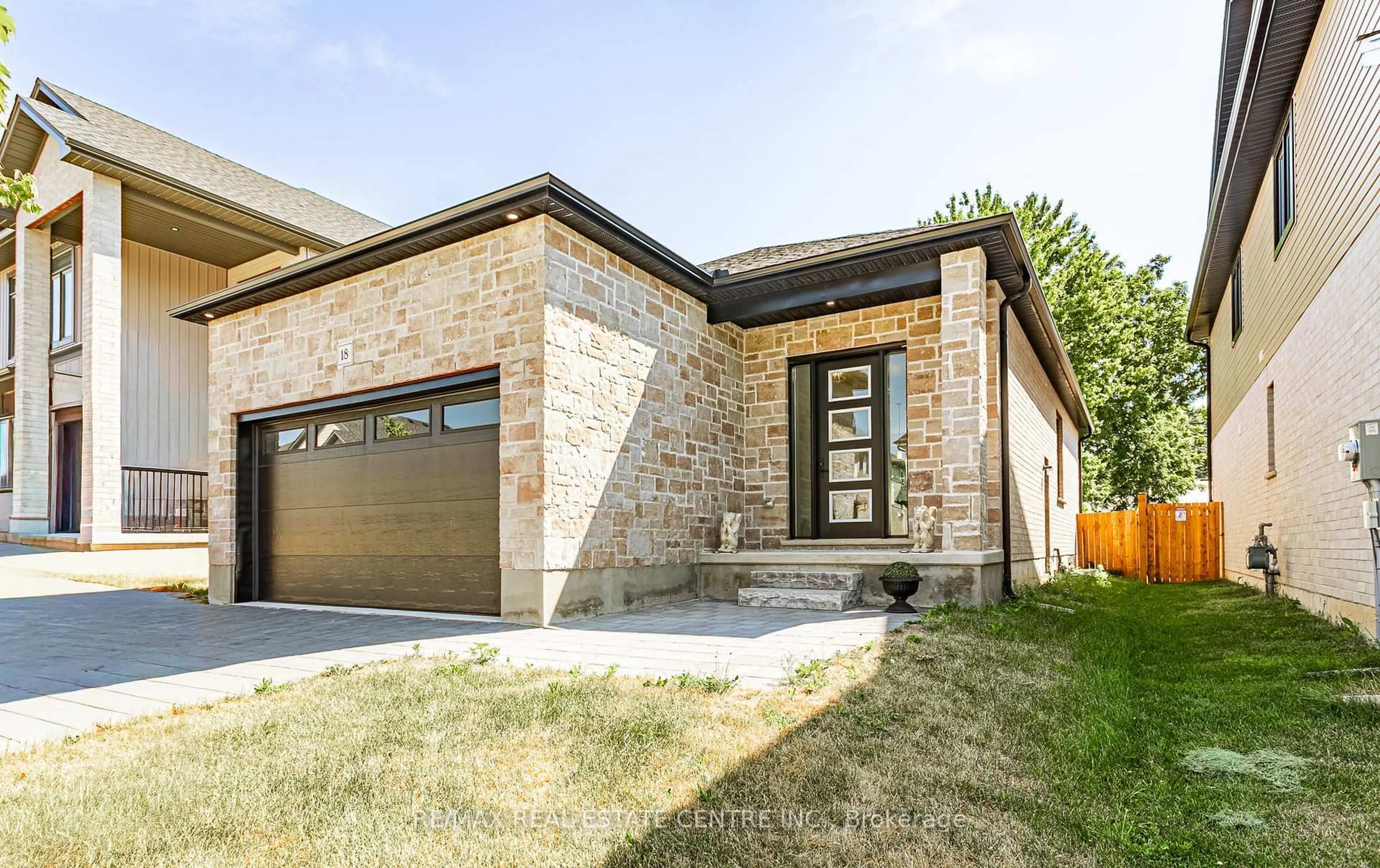 Home with brick exterior material, street for 7966 Fallon Dr #18, Lucan Biddulph Ontario N0M 1V0