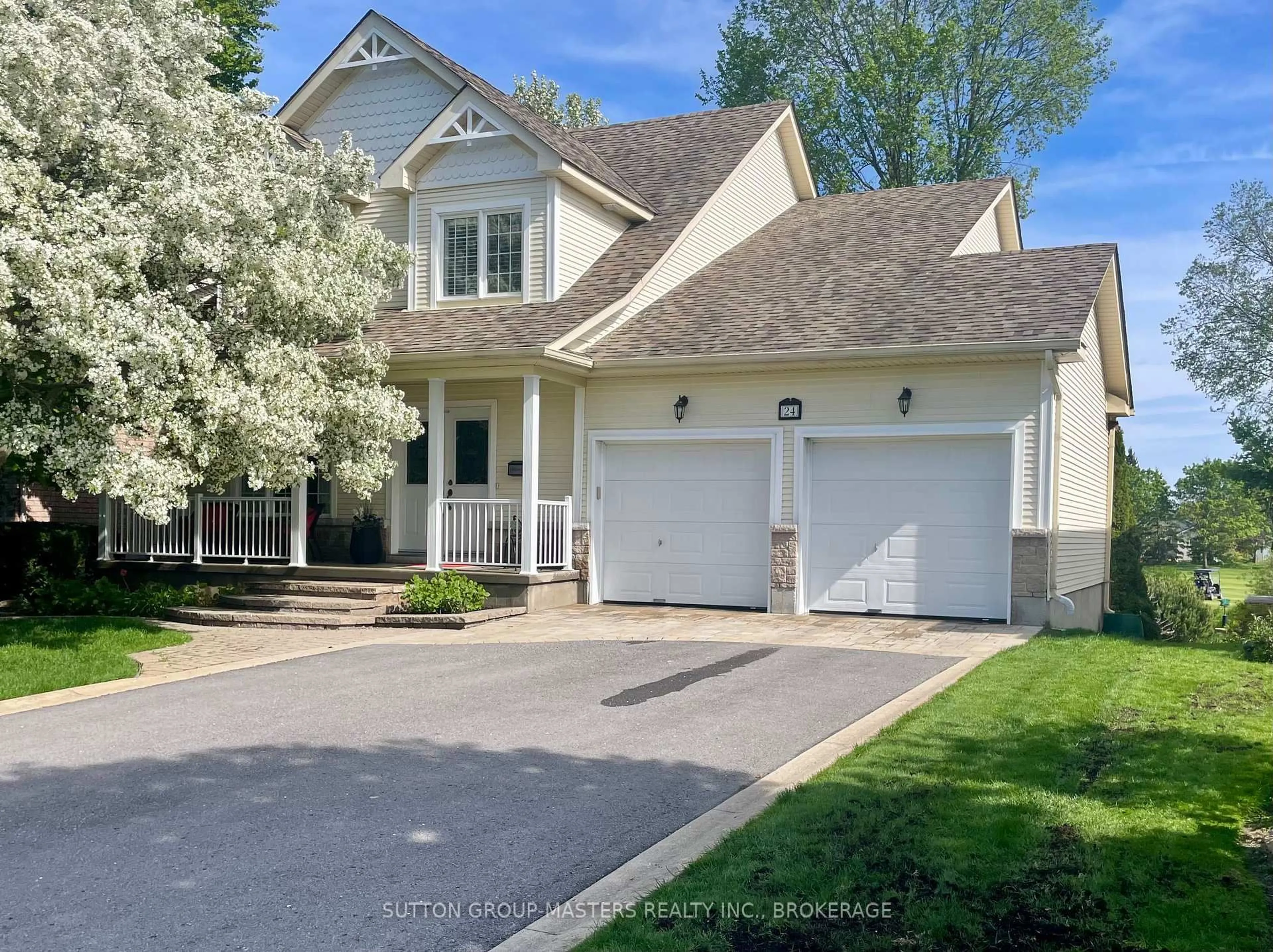 Home with vinyl exterior material, street for 24 Glenora Dr, Bath Ontario K0H 1G0