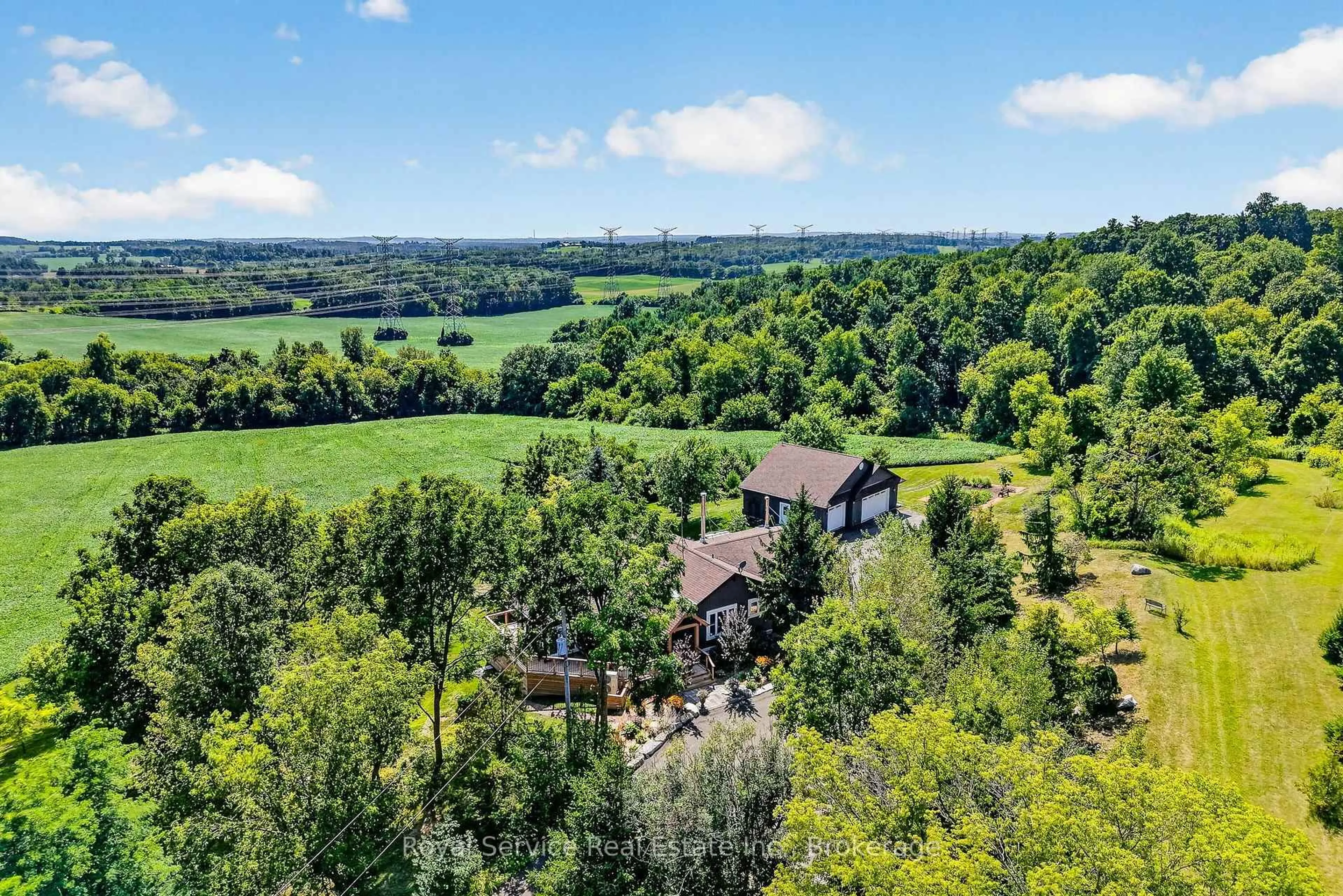 A pic from outside/outdoor area/front of a property/back of a property/a pic from drone, forest/trees view for 4374 Morton Rd, Hamilton Township Ontario L1A 3V6