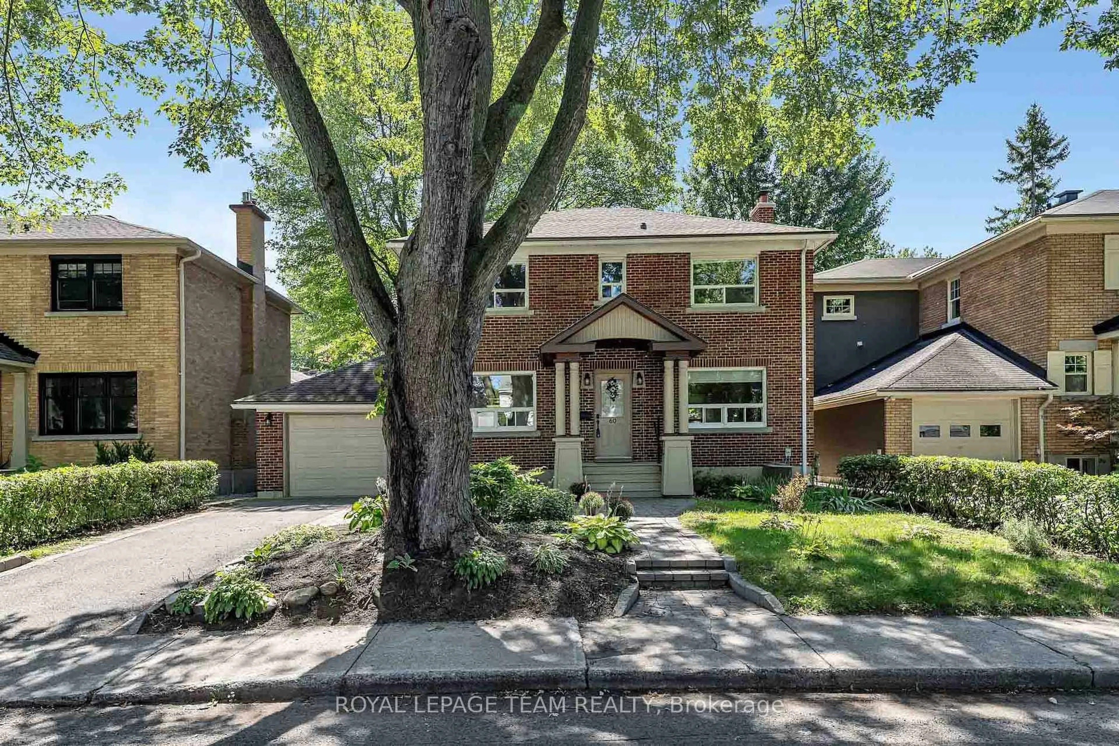 Home with brick exterior material, street for 60 Avenue Rd, Ottawa Ontario K1S 0N9