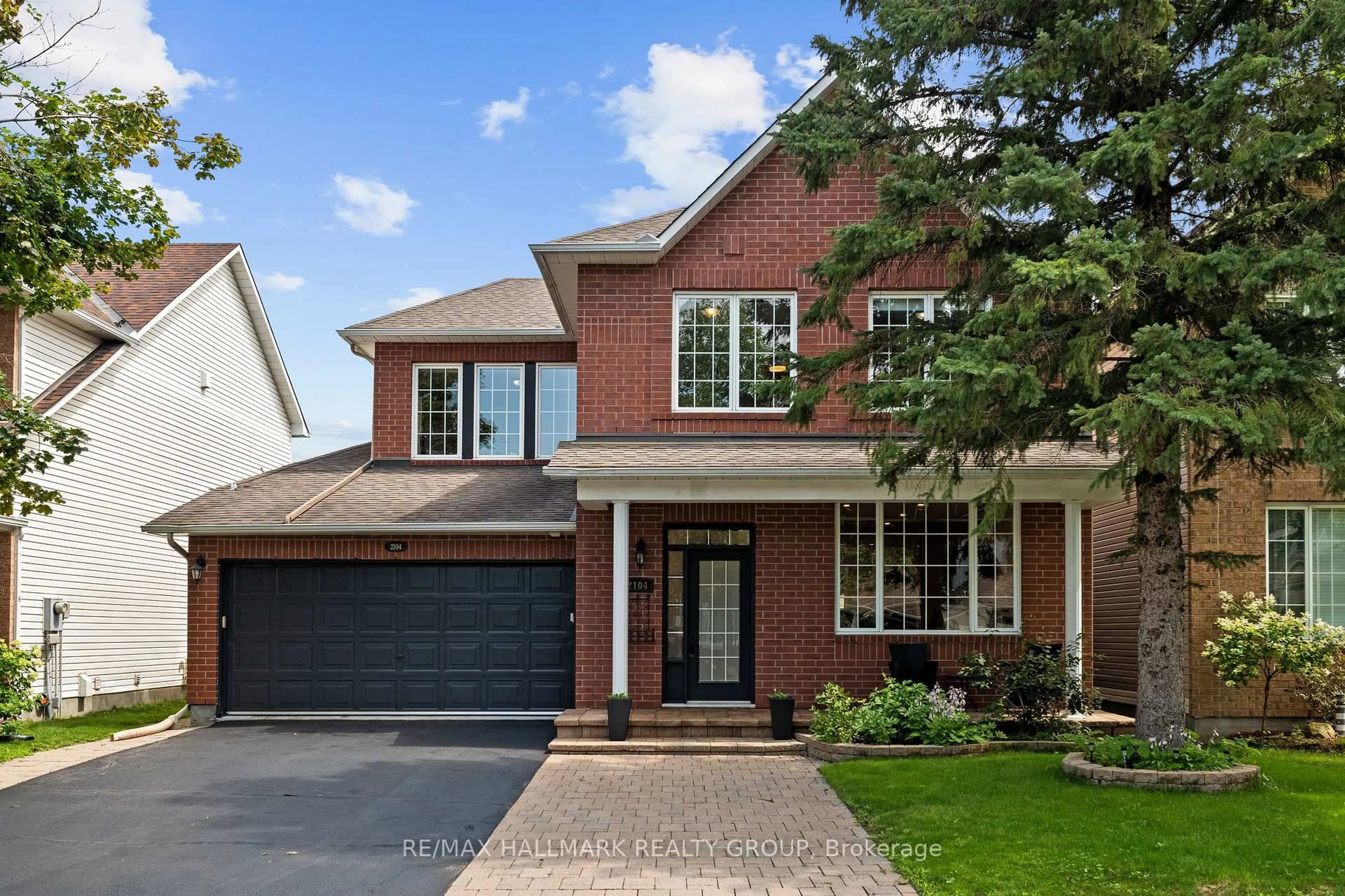 Home with brick exterior material, street for 2104 Sandy Oaks Dr, Ottawa Ontario K1W 1H5