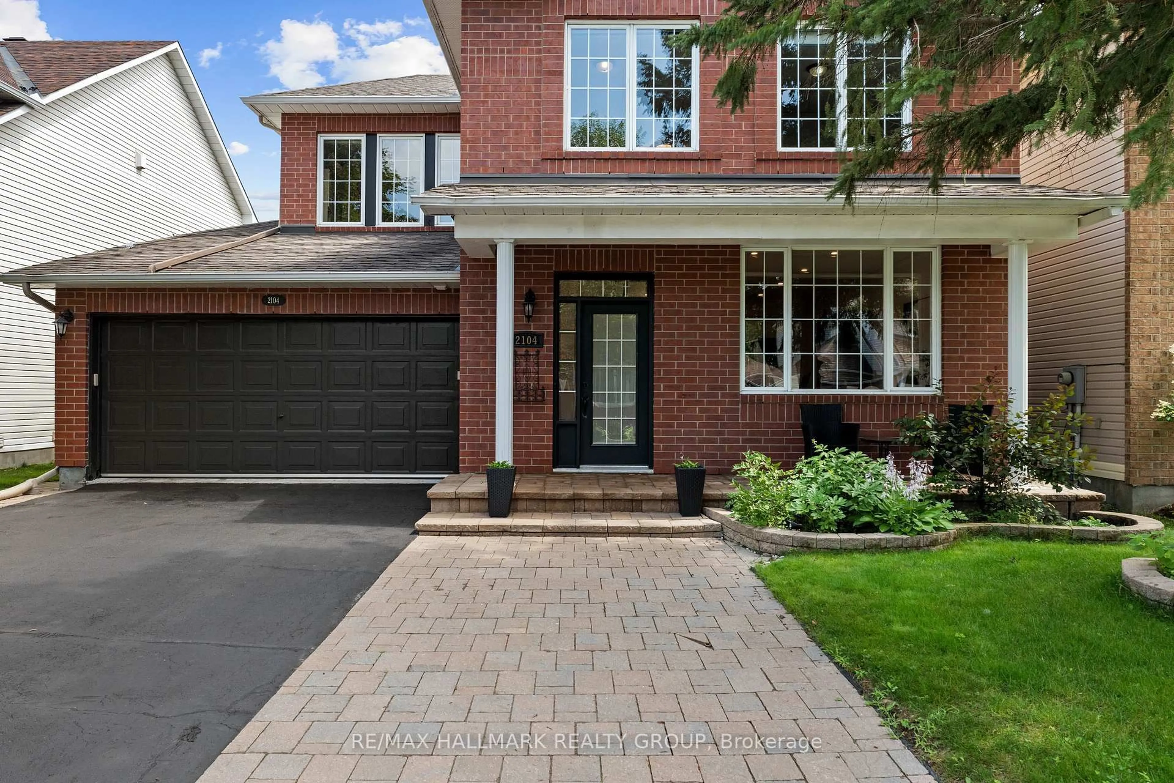 Home with brick exterior material, street for 2104 Sandy Oaks Dr, Ottawa Ontario K1W 1H5