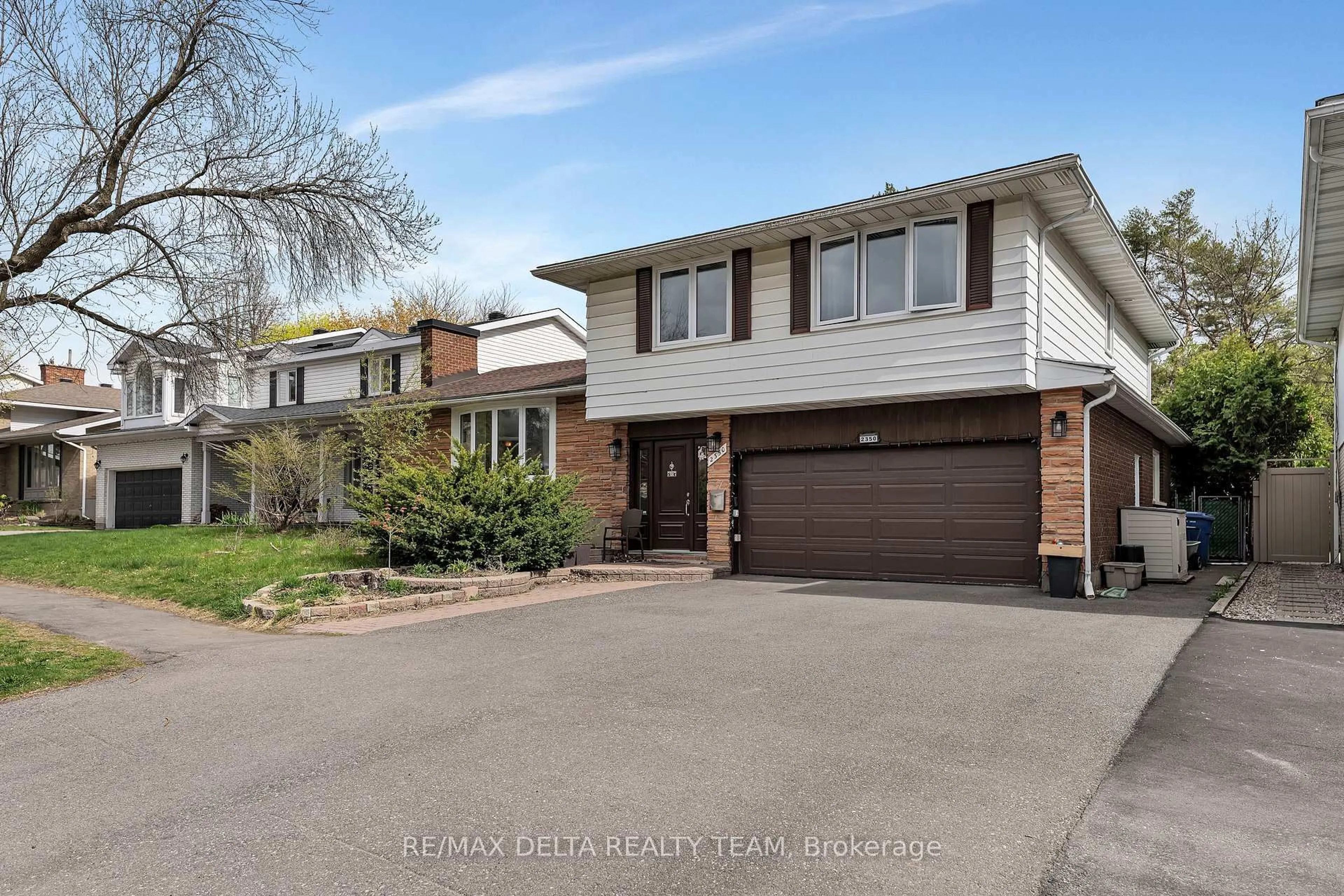 Home with brick exterior material, street for 2350 Georgina Dr, Ottawa Ontario K2B 7M5