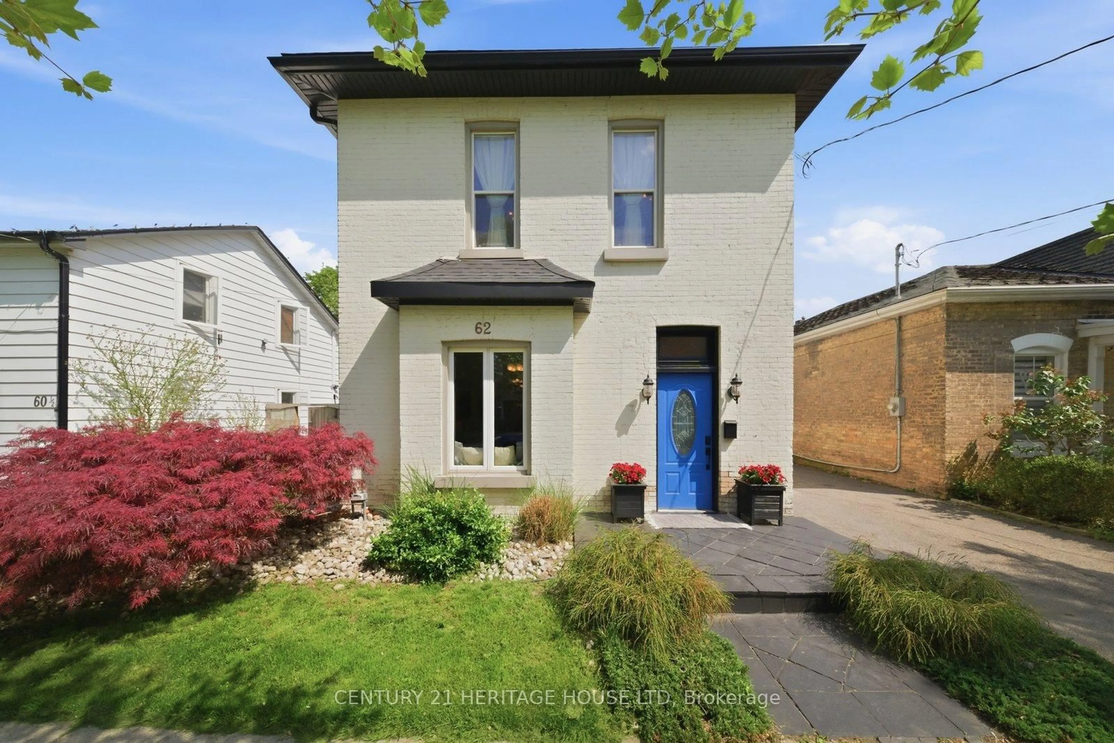 Home with brick exterior material, street for 62 East Ave, Brantford Ontario N3S 3L4