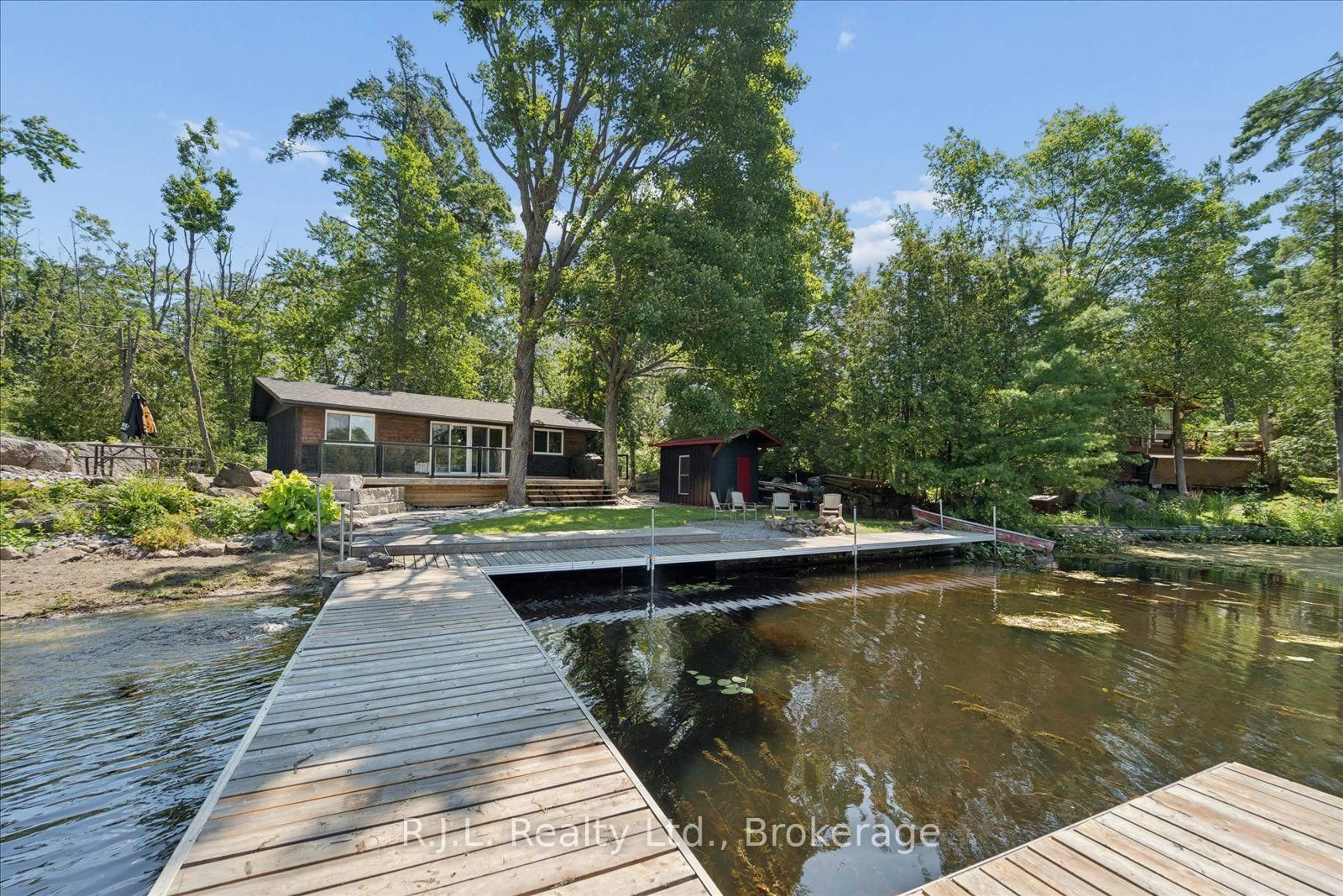 A pic from outside/outdoor area/front of a property/back of a property/a pic from drone, water/lake/river/ocean view for 14 Deer Bay Reach Rd, Trent Lakes Ontario K0L 1J0